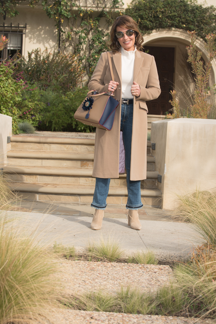 Givenchy Coat, Co Sweater, Rag and Bone Jeans, Stuart Weitzman Boots, Fendi Handbag, Miu Miu Sunglasses, Hermes Belt.