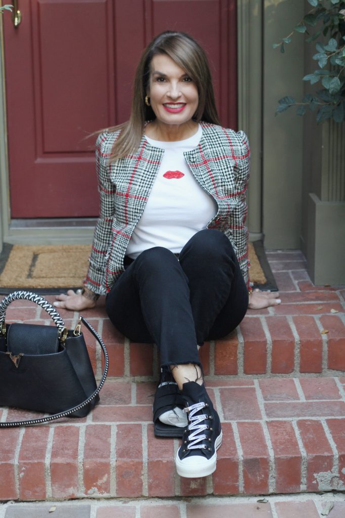 Oscar De La Renta Jacket, Sachin and Babi Top, Frame Jeans, Christian Dior High Tops, Chanel Shades, Louis Vuitton Handbag, Gucci Belt. 