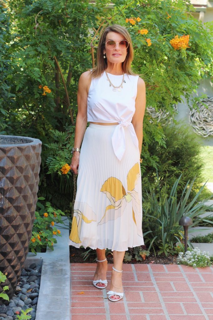 Reiss Skirt, Tibi Top, Tabitha Simmons Sandals, Gucci Shades, Kathryn Wagner Necklace, Oscar De La Renta Bracelet, Vintage Chanel Handbag.  