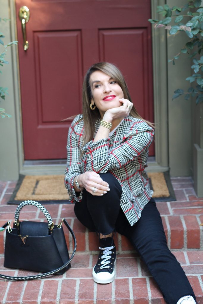 Oscar De La Renta Jacket, Sachin and Babi Top, Frame Jeans, Christian Dior High Tops, Chanel Shades, Louis Vuitton Handbag, Gucci Belt. 