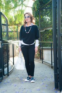 DIANE COTTON NECKLACE, FENDI SHOES, WORTH NEW YORK BLOUSE AND SWEATER, J BRAND JEANS, MAISON MARGIELA HANDBAG, CHRISTIAN DIOR SUNGLASSES.