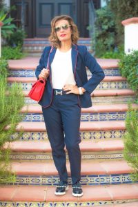 Sandro Pants and Jacket; Rag and Bone T-Shirt; Robert Clergerie Shoes; Hermes Belt; Chanel Handbag, Cuff, and Sunglasses; Christian Dior Earrings.