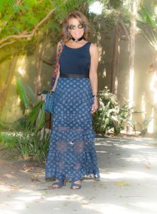 Worth New York Tank and Skirt, Celine Sandals, Valentino Handbag, Chiara Ferragni Choker, Sarah Pacini Belt, Jewels by Caryn Earrings, Miu Miu Shades.