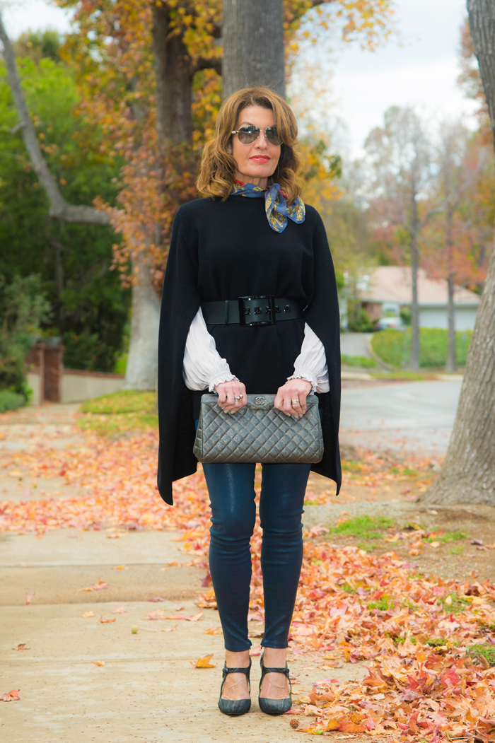 Worth New York Cape and Belt, Ulla Johnson Blouse, Level 99 Leather Pants, Stuart Weitzman Shoes, Chanel Sunglasses and Clutch, Julie Starr Dresner Scarf.