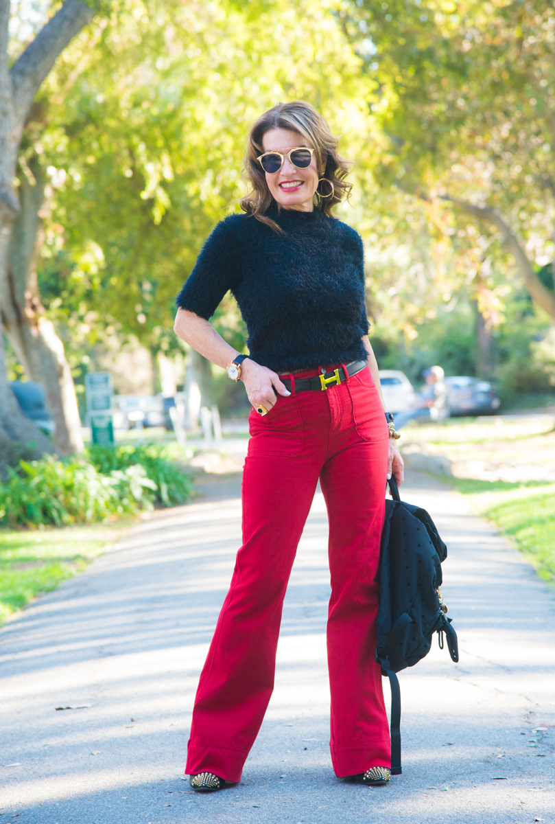 Alice and Olivia Wide Leg Jean, Aqua Sweater, Gucci Booties, Dior Shades, Henri Bendel Earrings, Ashneil Belt.