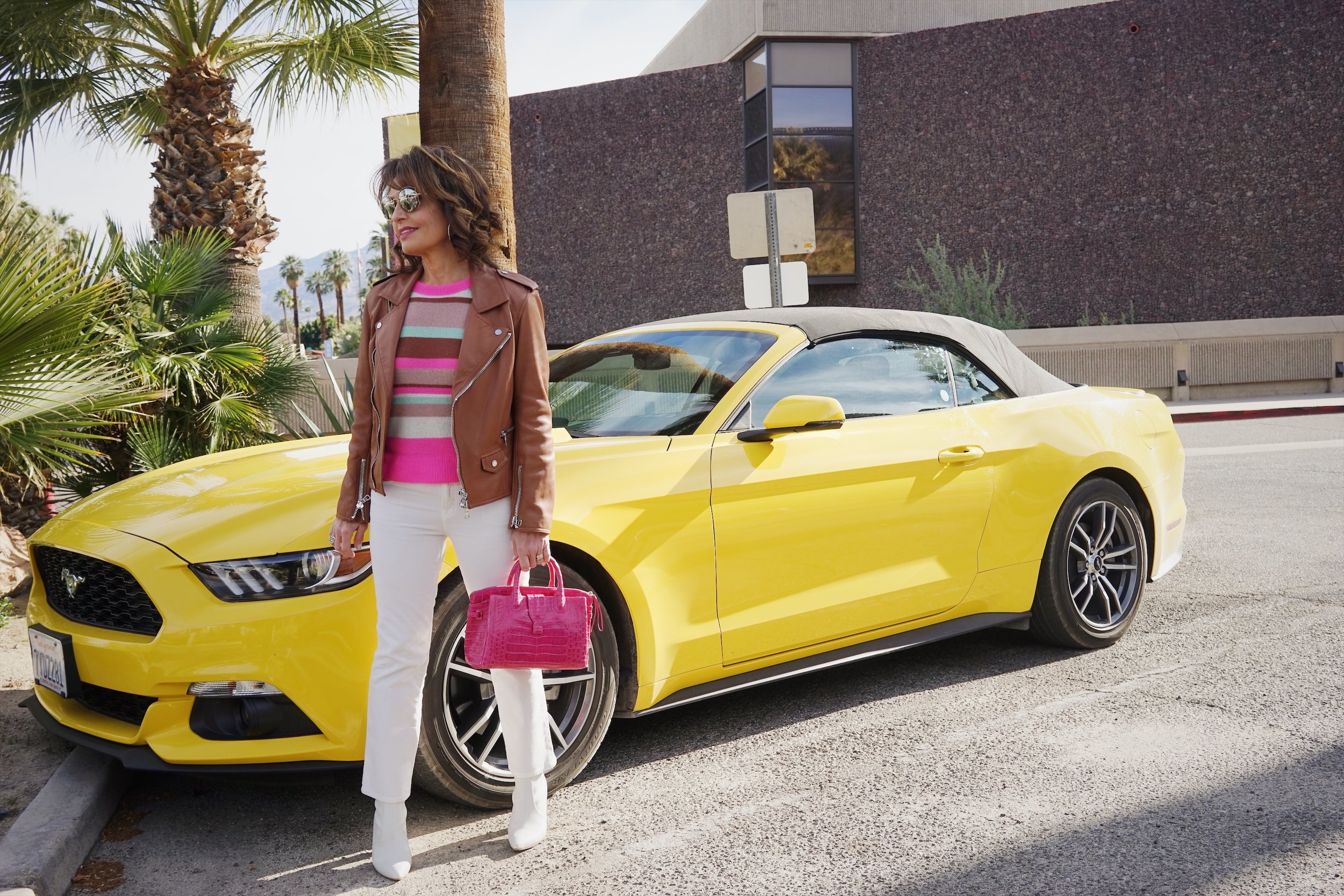 Philip Lim Jacket, Sies Marjan Sweater, J Brand Corduroy Pants, Stuart Weitzman Boots, Nancy Gonzalez Handbag, Miu Miu Shades, John Hardy Hoop Earrings, Spinelli Kilcollin Ring.