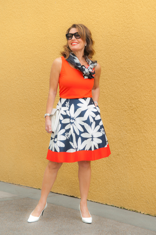 Top, Scarf, Skirt, and Clutch: Worth New York. Prada Pumps, Celine Glasses, Christian Dior Tribal Earrings.