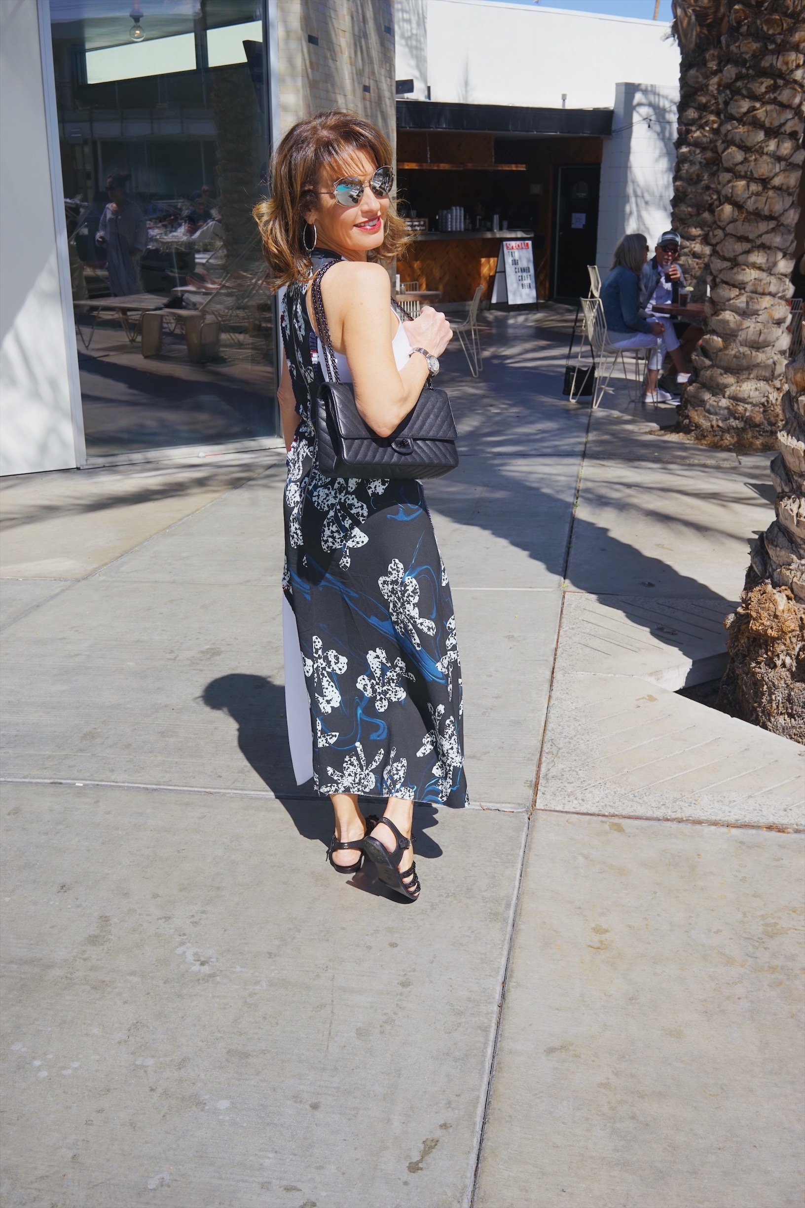 Cedric Charlier Dress, Chanel Sandals and Handbag, Comrags Sweater, John Hardy Earrings, The jewelry Bar Bracelets, Miu Miu Sunglasses.