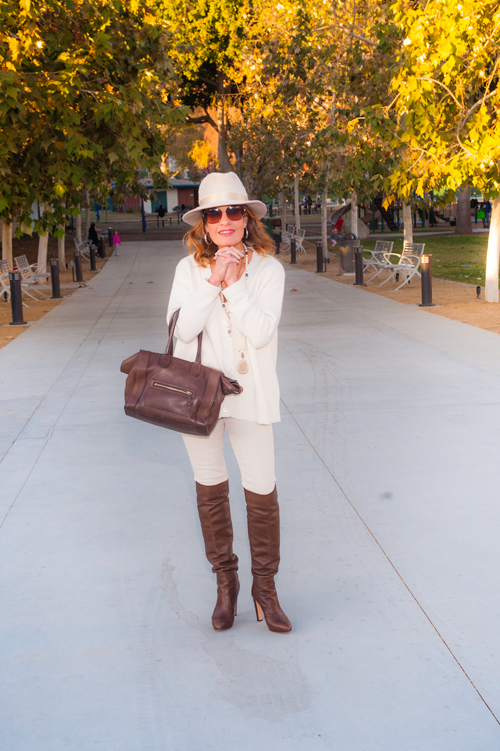 Filuhats Hat, Co Sweater, Joie Tank, AG Jeans , Gianvito Rossi Boots, Celine Handbag, Calypso St. Barth Necklaces, Stone and Leaf.