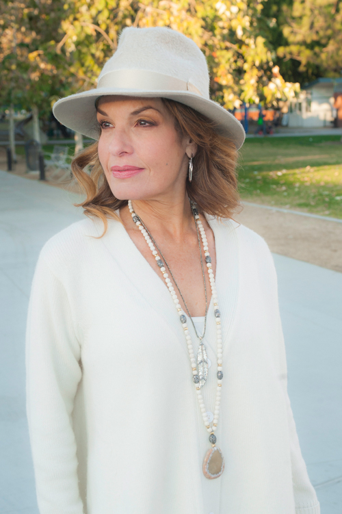 Filuhats Hat, Co Sweater, Joie Tank, AG Jeans , Gianvito Rossi Boots, Celine Handbag, Calypso St. Barth Necklaces, Stone and Leaf.