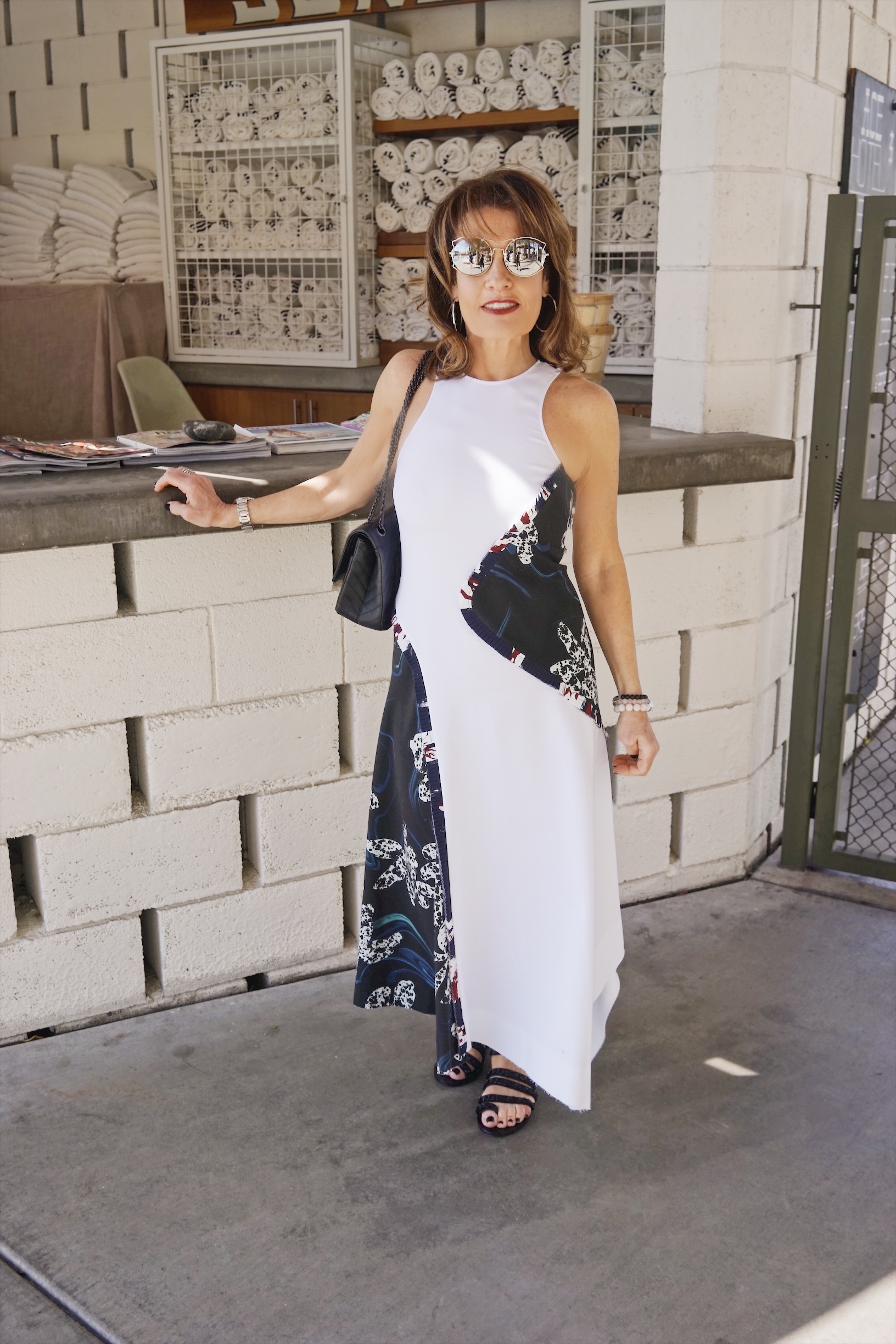 Cedric Charlier Dress, Chanel Sandals and Handbag, Comrags Sweater, John Hardy Earrings, The jewelry Bar Bracelets, Miu Miu Sunglasses.