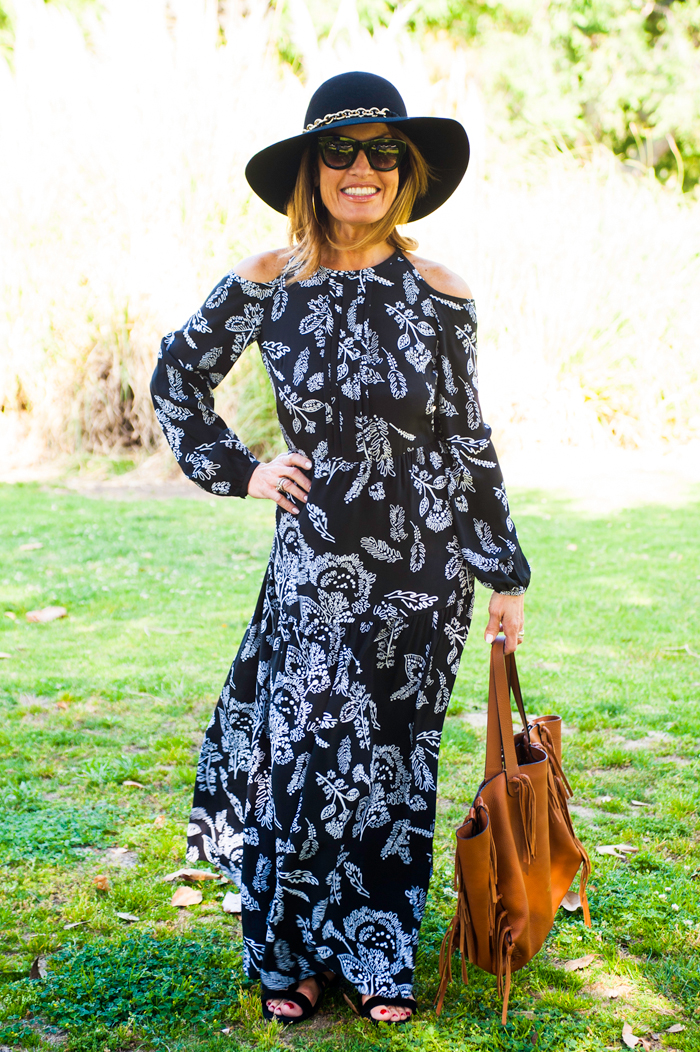   Thakoon Addition Dress , Lanvin Hat, similar here, Valentino Bag, similar  here , Celine Sunglasses and  Gianvito Rossi Gladiators , Calypso St. Barth Hoops. 