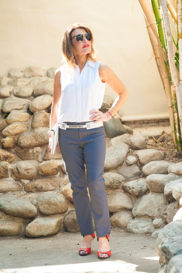   Blouse ,  Pants , Belt and Clutch all by Worth New York.  Earrings ,  Necklace , and  Bracelets  by John Hardy. Oliver Peoples shades and Bottega Venetta Sandals.  