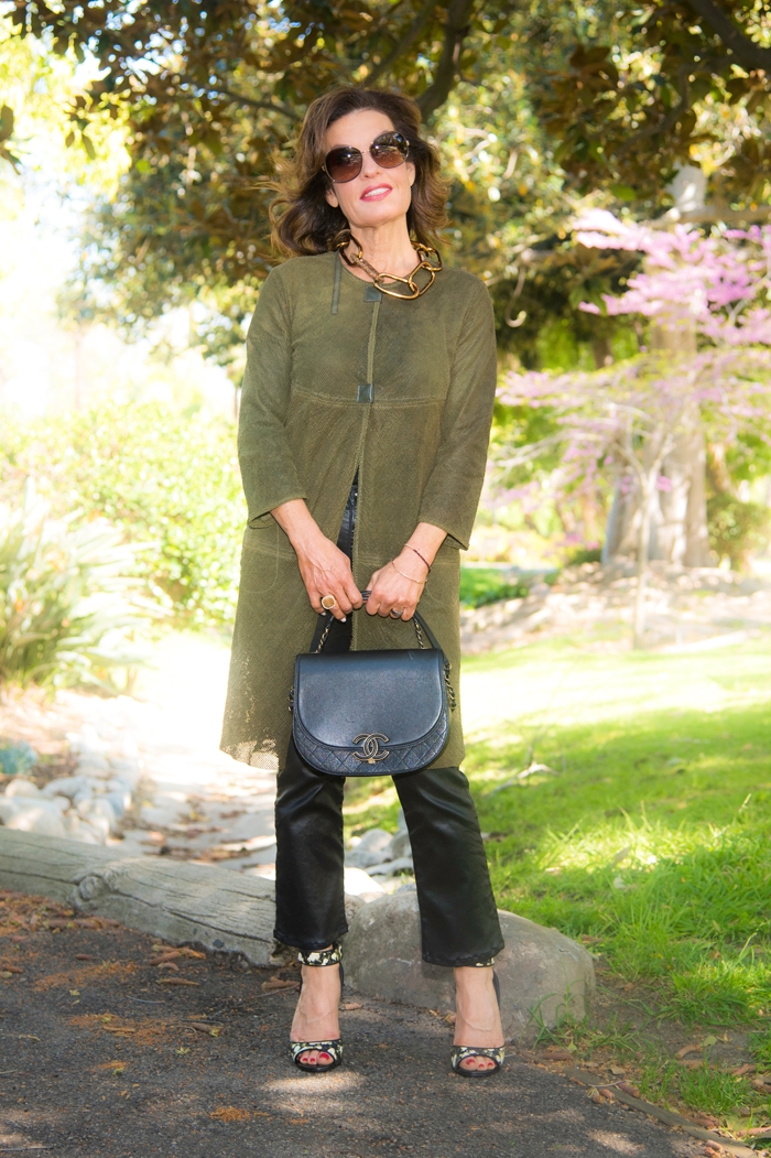 Artico Jacket, AG Pants, The Row Tank Top, The Row Heels, Balenciaga Choker, Monique Pean Ring, Chanel Handbag, Oliver Peoples Sunglasses.