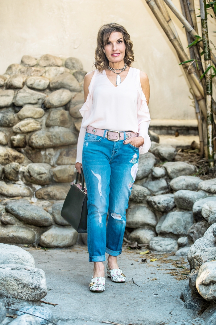 Aqua Blouse, 7 For All Mankind Jeans, Fendi Handbag, Gucci Shoes, Robin Terman Necklace.