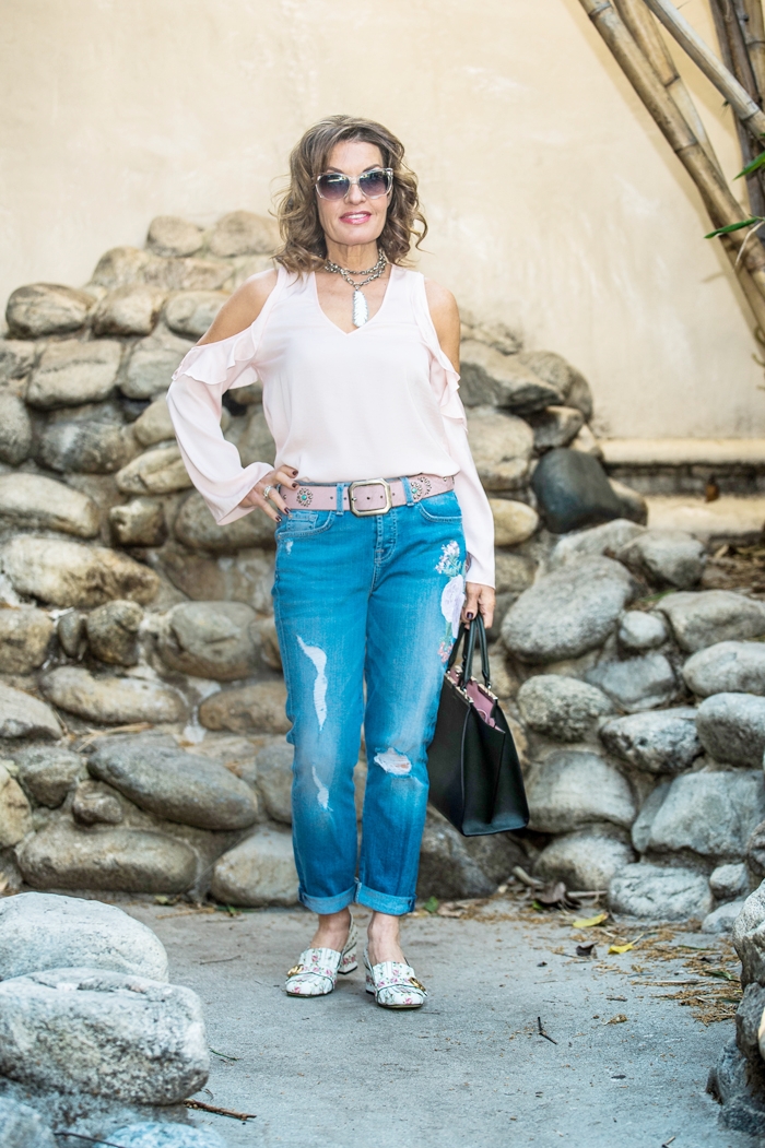 Aqua Blouse, 7 For All Mankind Jeans, Fendi Handbag, Gucci Shoes, Robin Terman Necklace.