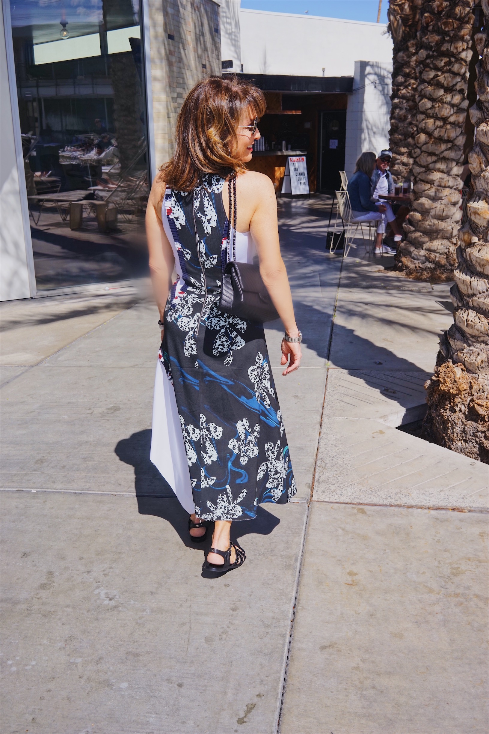 Cedric Charlier Dress, Chanel Sandals and Handbag, Comrags Sweater, John Hardy Earrings, The jewelry Bar Bracelets, Miu Miu Sunglasses.