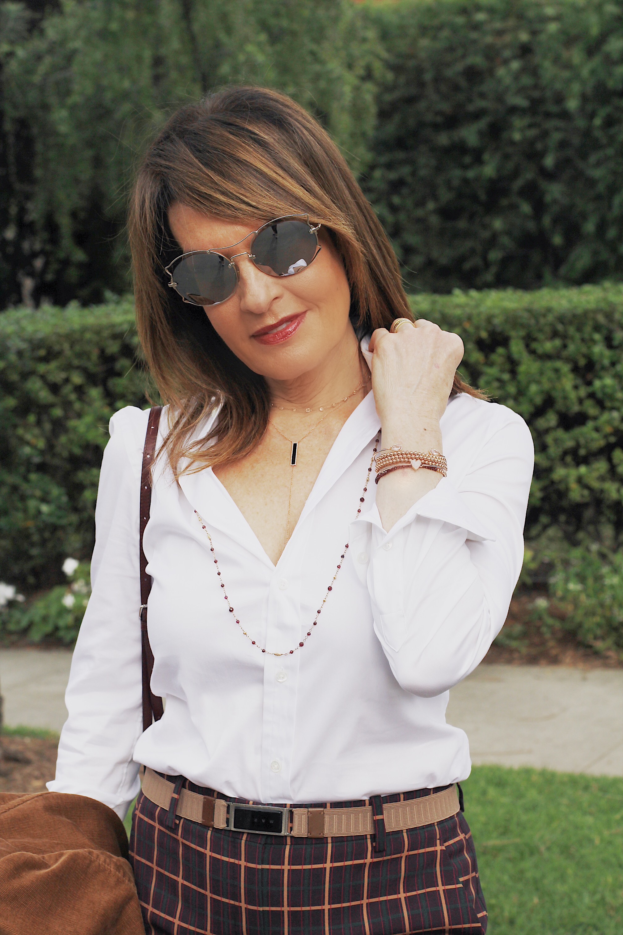 Theory Pant, Cabi Jacket, Ralph Lauren Blouse, Marni Belt, Stuart Weitzman Boots, Fendi Handbag and Charm, Miu Miu Sunglasses, Robin Terman Necklaces and Bracelets, Anne Sisteron Choker.