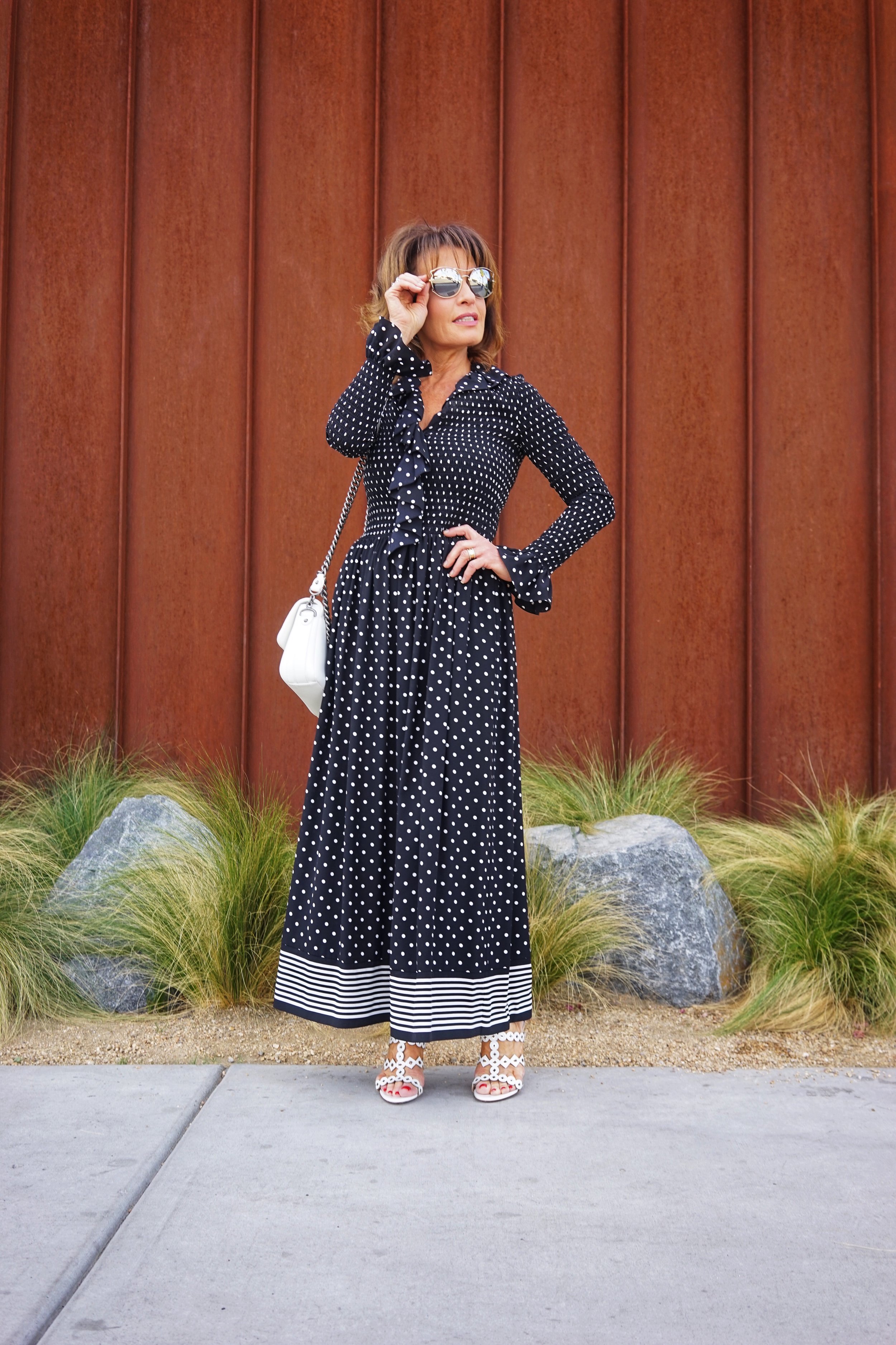 Stella McCartney Jumpsuit, Chanel Handbag, Alaia Sandals,   Miu Miu Shades, John Hardy Hoops .