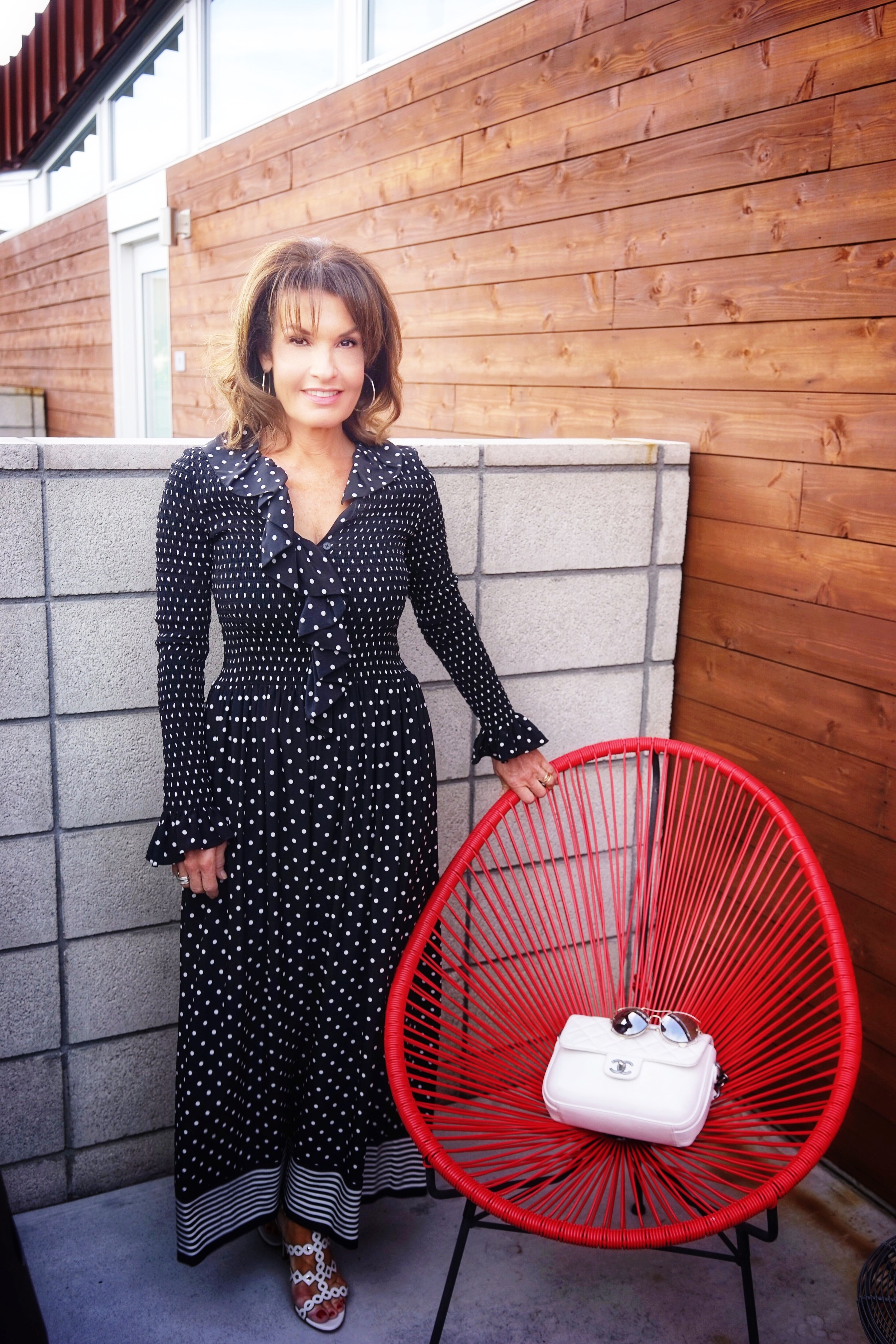 Stella McCartney Jumpsuit, Chanel Handbag, Alaia Sandals,   Miu Miu Shades, John Hardy Hoops .