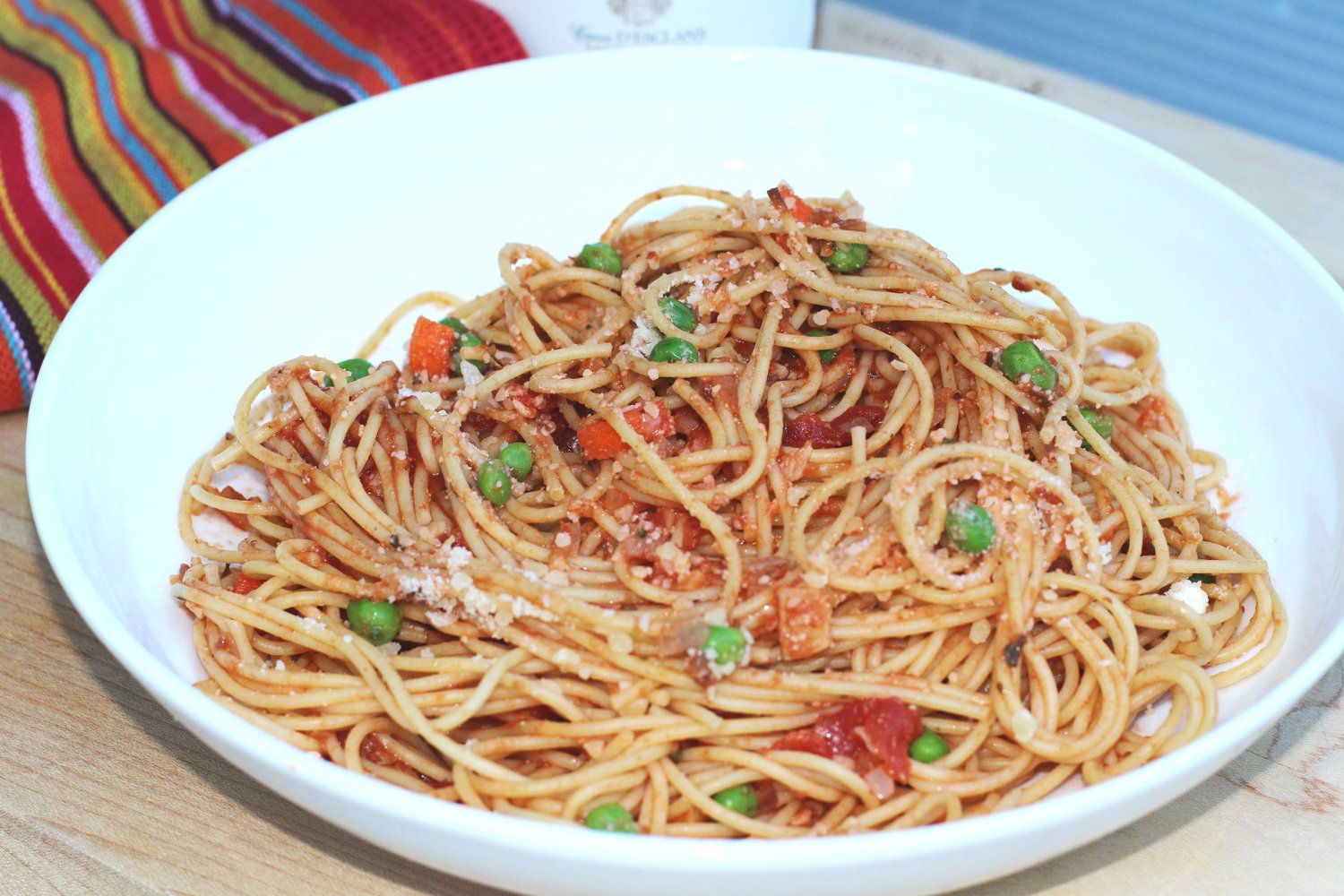 Capellini with Tomato and Peas Recipe.