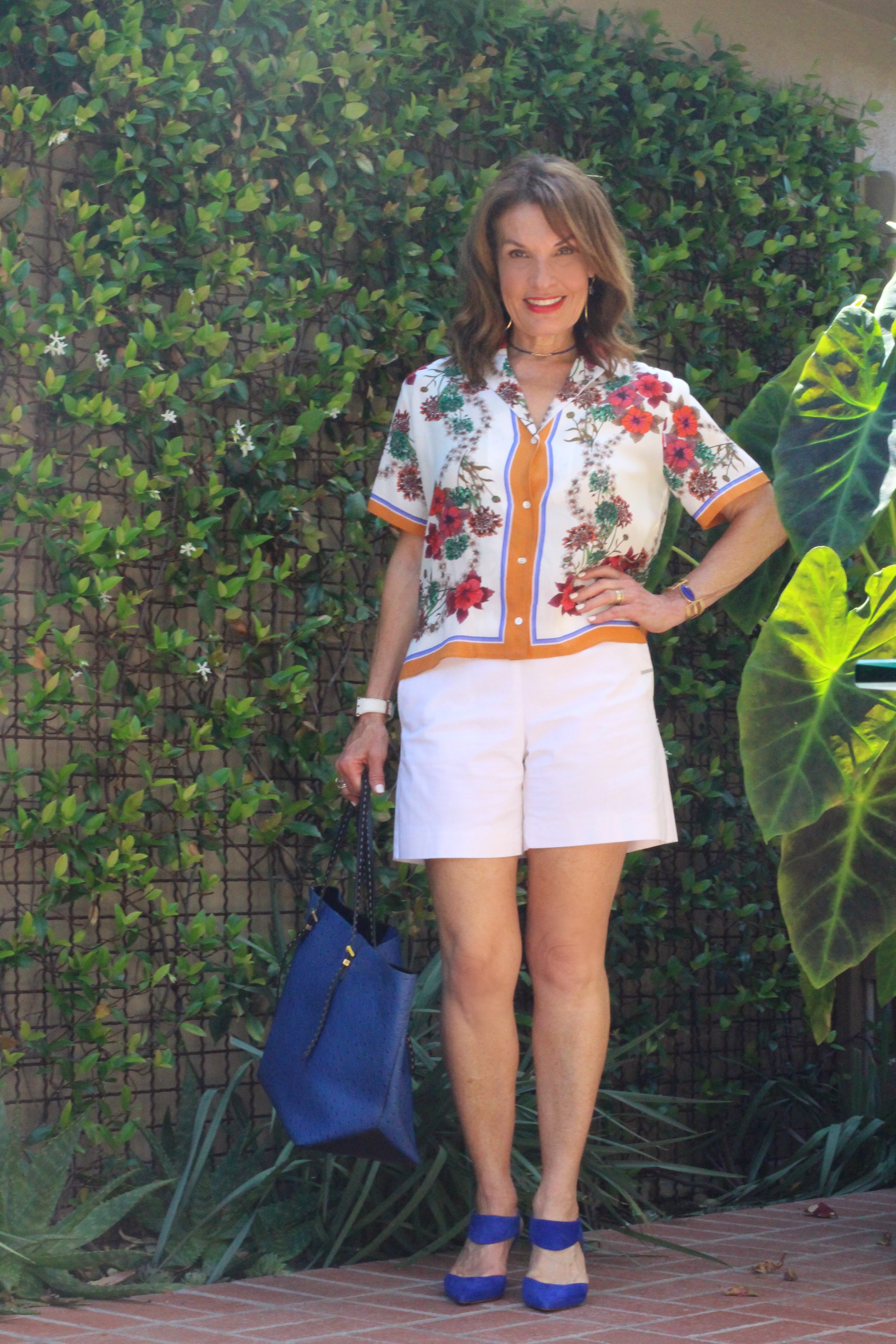 Sandro Blouse, Worth New York Shorts, Nicholas Kirkwood Shoes, Michael Kors Tote, Tous Watch, Under A Fig Tree Bracelet, Elizabeth and James Earrings, Robin Terman Choker, Celine Sunnies.