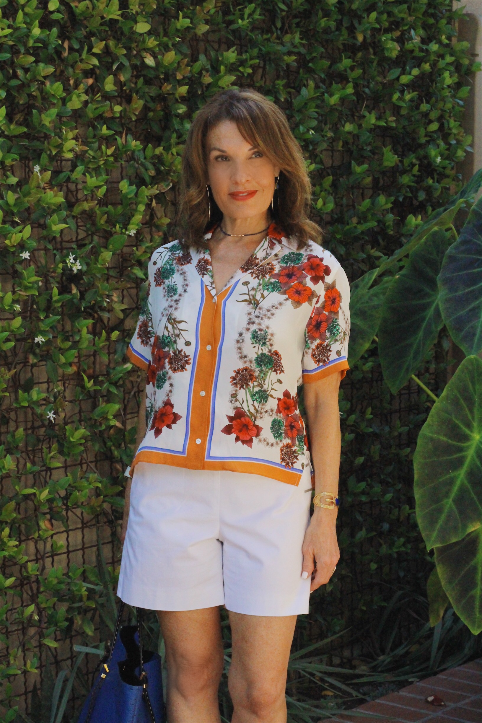 Sandro Blouse, Worth New York Shorts, Nicholas Kirkwood Shoes, Michael Kors Tote, Tous Watch, Under A Fig Tree Bracelet, Elizabeth and James Earrings, Robin Terman Choker, Celine Sunnies.