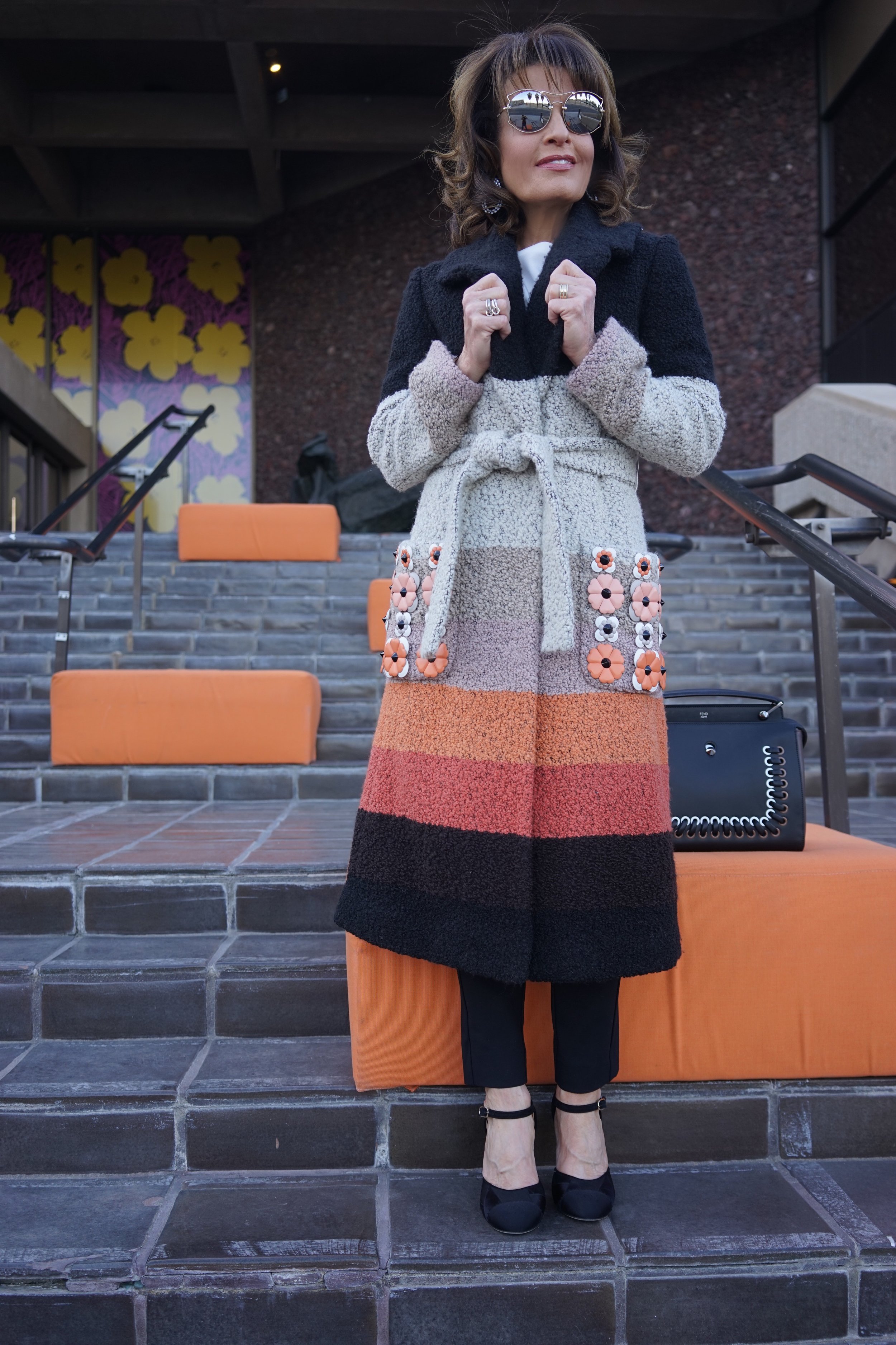 Fendi Sweater Coat, Phillip Lim Blouse, Rag and Bone Pants, Chanel Shoes, Fendi Bag, The Jewelry Bar Earrings, Miu Miu Shades.