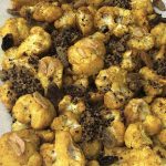 Turmeric Roasted Cauliflower with Raisins and Crispy Quinoa