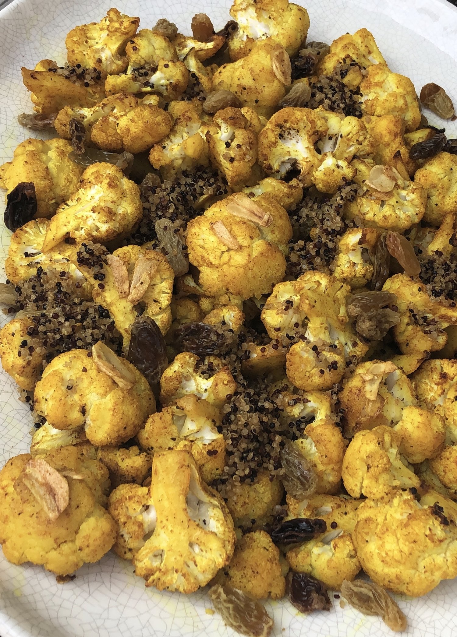 Turmeric Roasted Cauliflower with Raisins and Crispy Quinoa