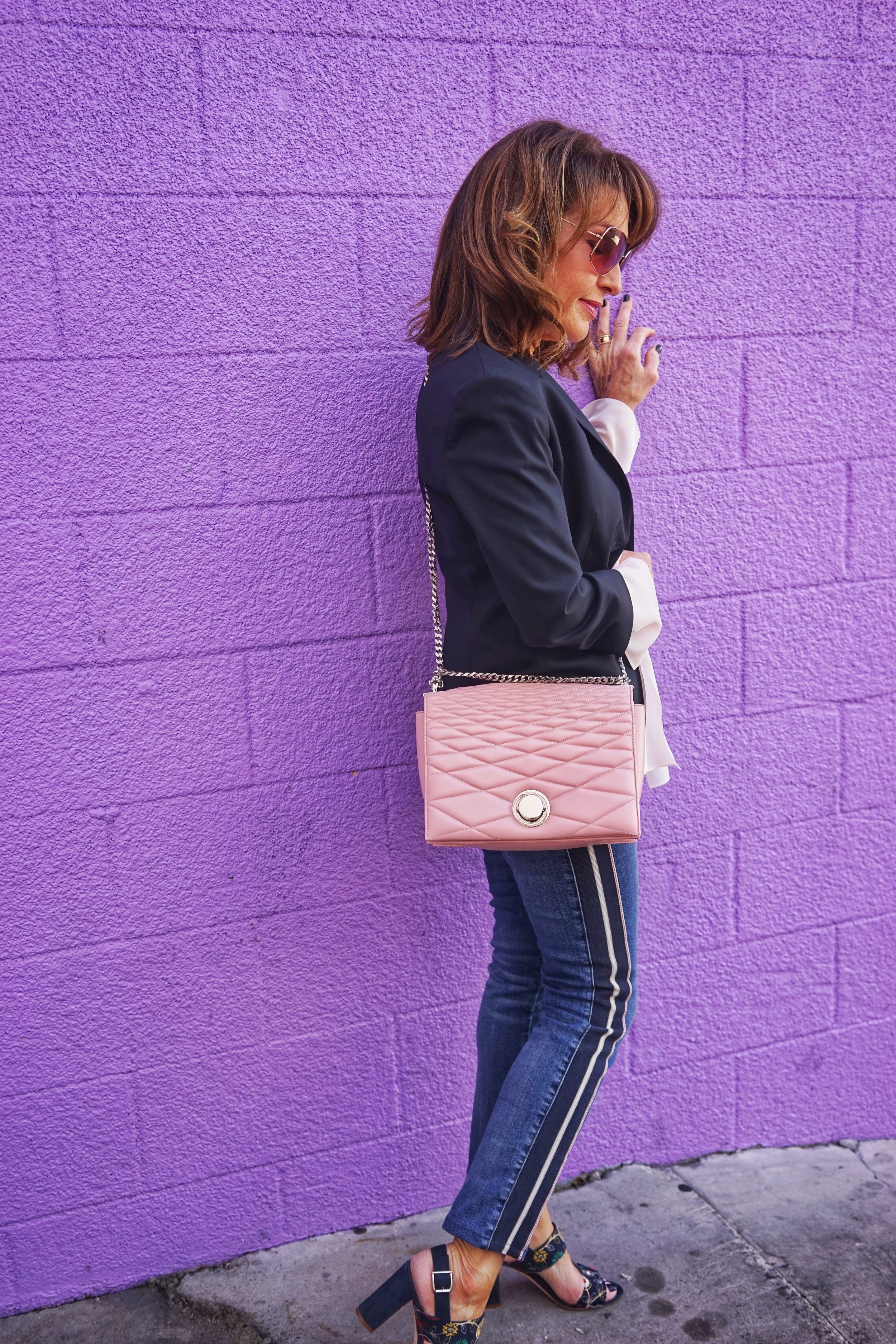  The Row Jacket, Chloe Blouse, Alexander McQueen Jeans, Manolo Blahnik Sandals, Bally Handbag, Robin Terman Bracelets, Ippolita Earrings,  Anne Sisteron Choker, Dominique Cohen necklace, Suneera Ring, Oliver Peoples Sunglasses.