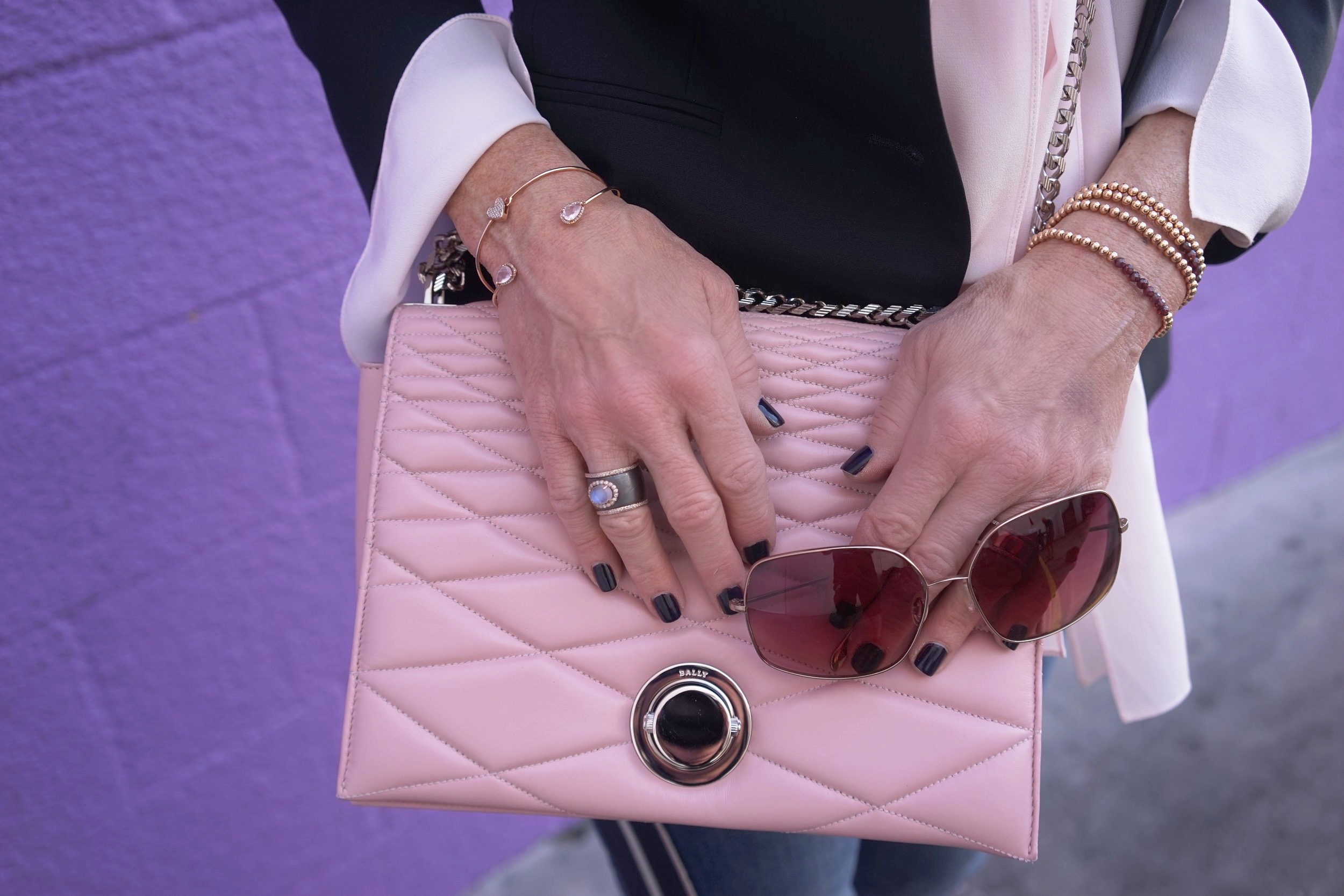  The Row Jacket, Chloe Blouse, Alexander McQueen Jeans, Manolo Blahnik Sandals, Bally Handbag, Robin Terman Bracelets, Ippolita Earrings,  Anne Sisteron Choker, Dominique Cohen necklace, Suneera Ring, Oliver Peoples Sunglasses.