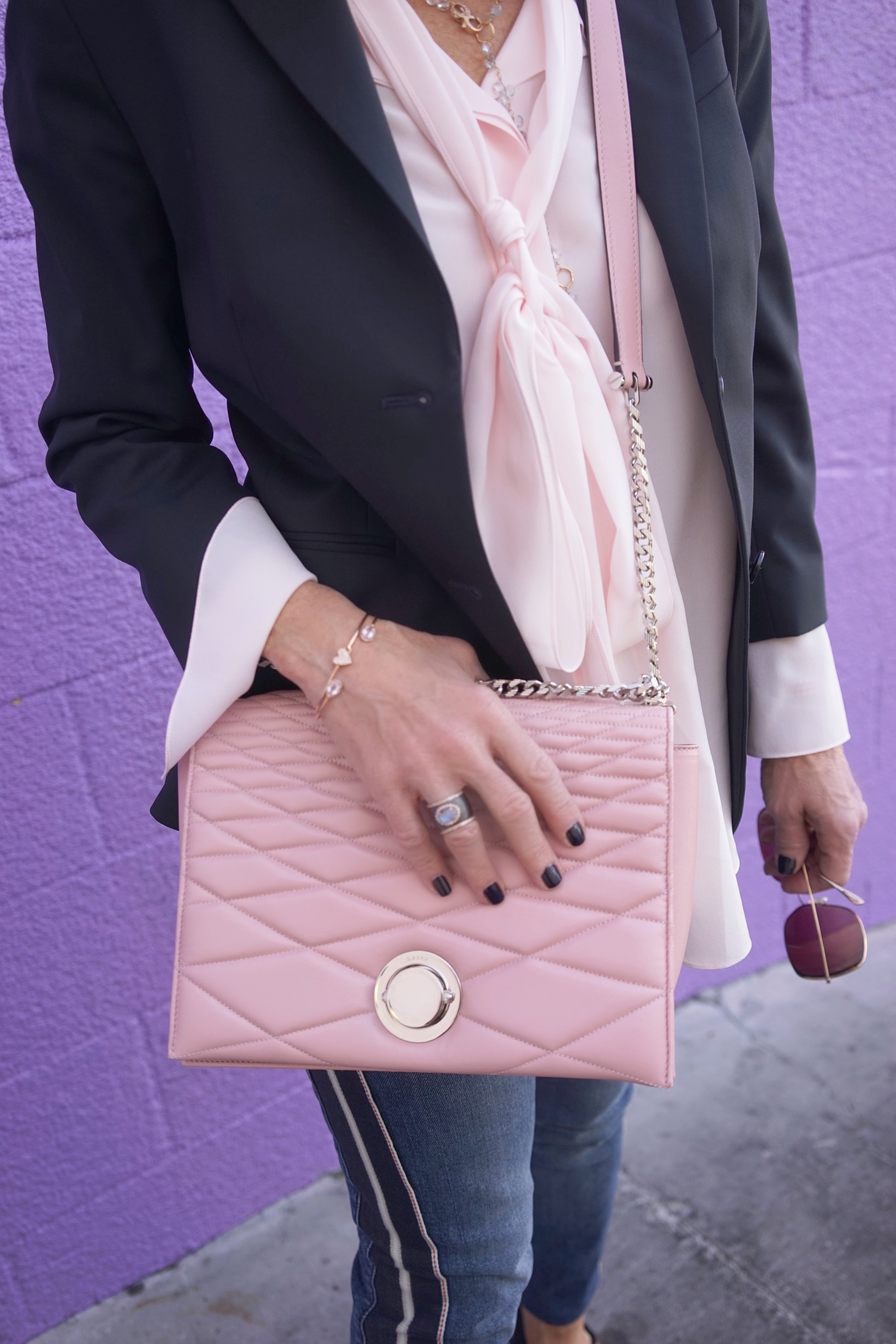  The Row Jacket, Chloe Blouse, Alexander McQueen Jeans, Manolo Blahnik Sandals, Bally Handbag, Robin Terman Bracelets, Ippolita Earrings,  Anne Sisteron Choker, Dominique Cohen necklace, Suneera Ring, Oliver Peoples Sunglasses.