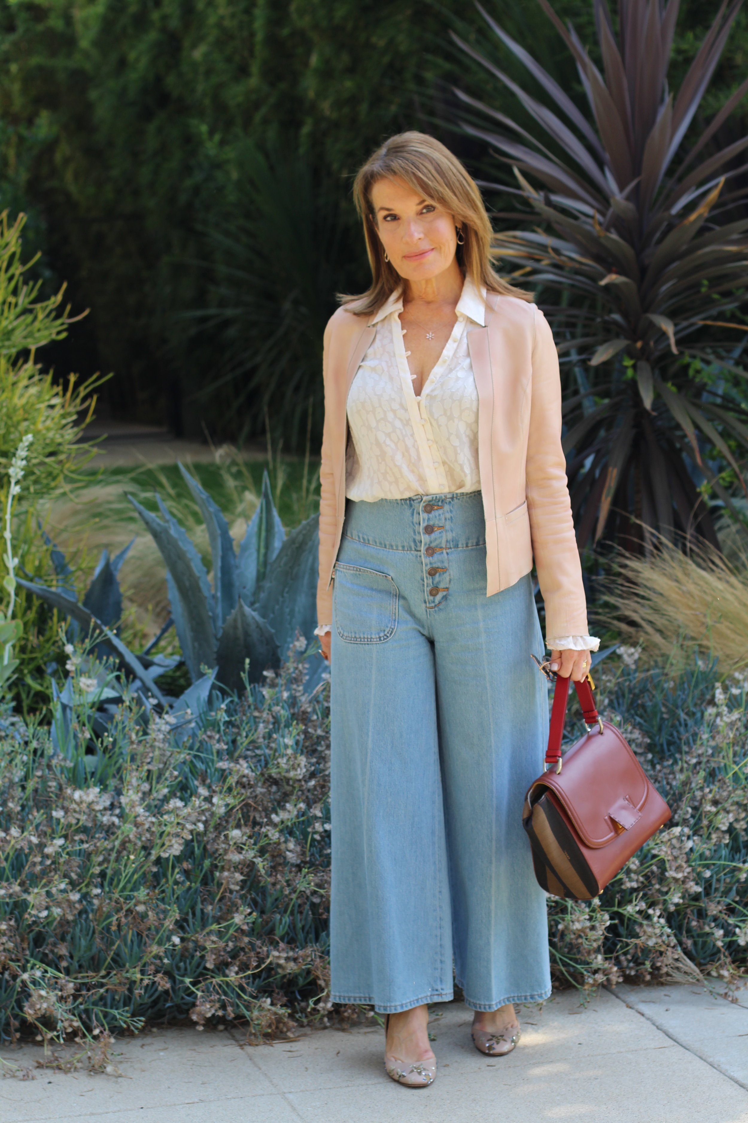 Lamarque Jacket, Paige Blouse, Marc Jacobs Jeans, Fendi Handbag, Prada Sunglasses, Valentino Shoes, Ipollita Earrings, Robin Terman Necklace.