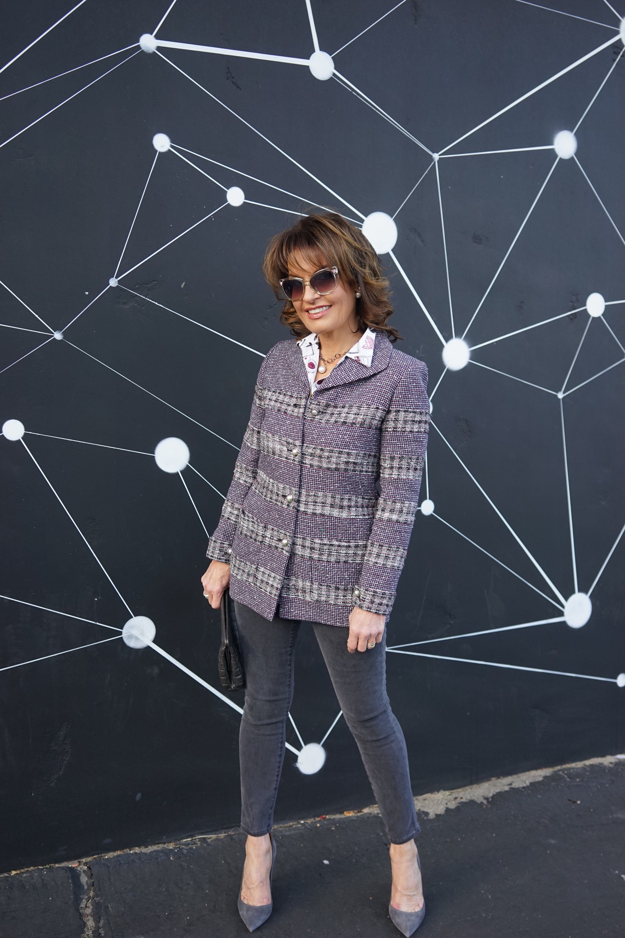 Chanel Jacket and Clutch, Equipment Blouse, J Brand Jeans, Gianvanito Rossi Pumps, Christian Dior Shades and Tribal Earrings.