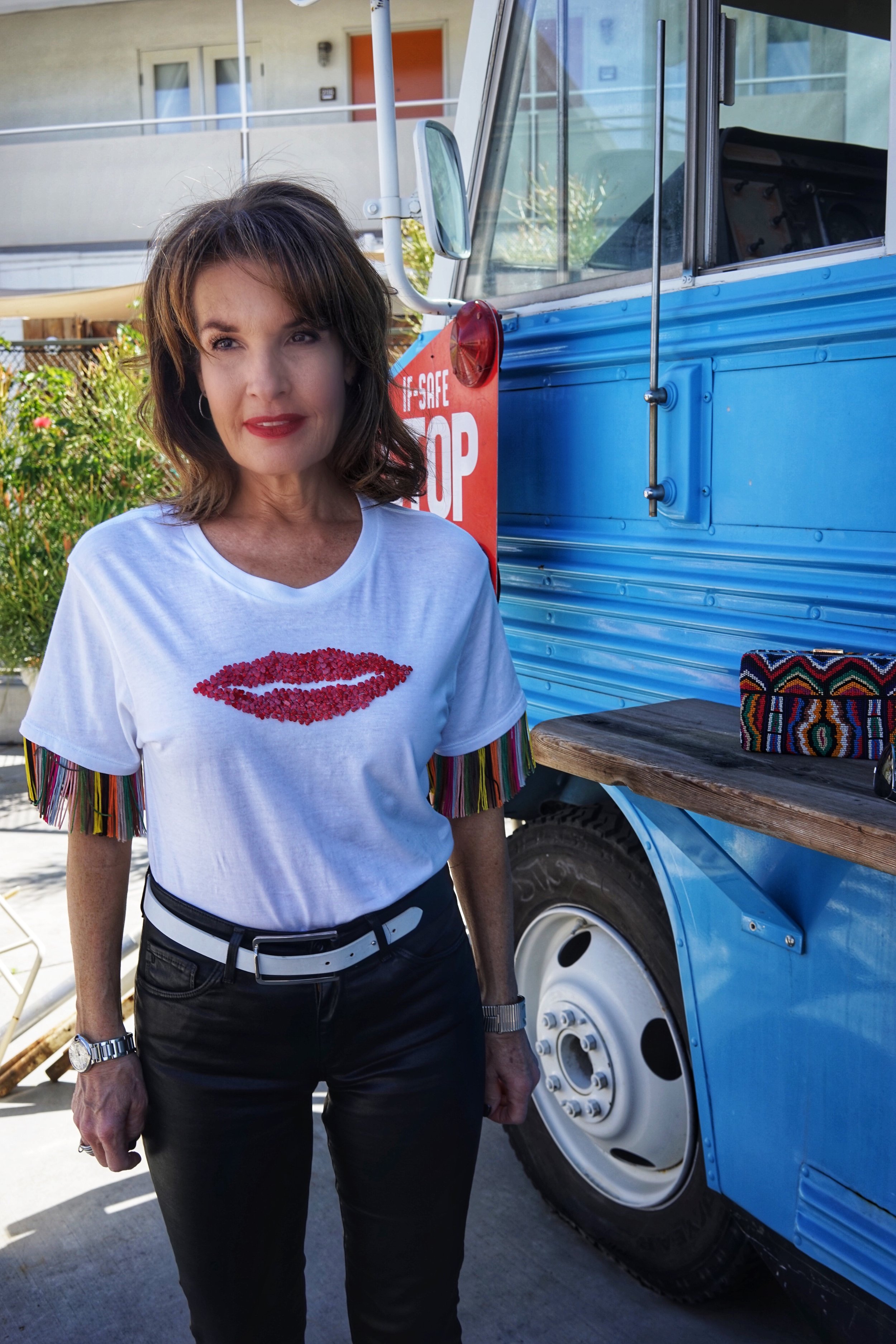 Sachin and Babi T-shirt, AG Coated Jeans,  Worth New York Belt, Valentino Clutch, Gianvito Rossi Pumps, Chanel Shades and Cuff.