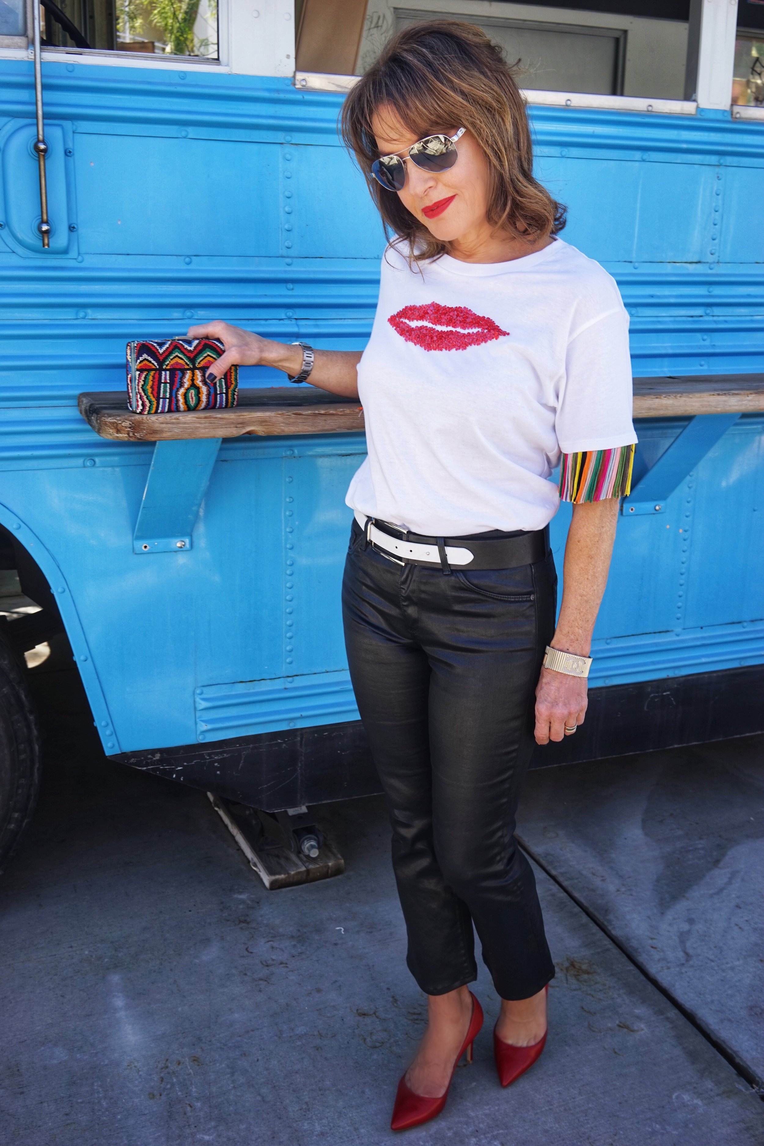 Sachin and Babi T-shirt, AG Coated Jeans,  Worth New York Belt, Valentino Clutch, Gianvito Rossi Pumps, Chanel Shades and Cuff.