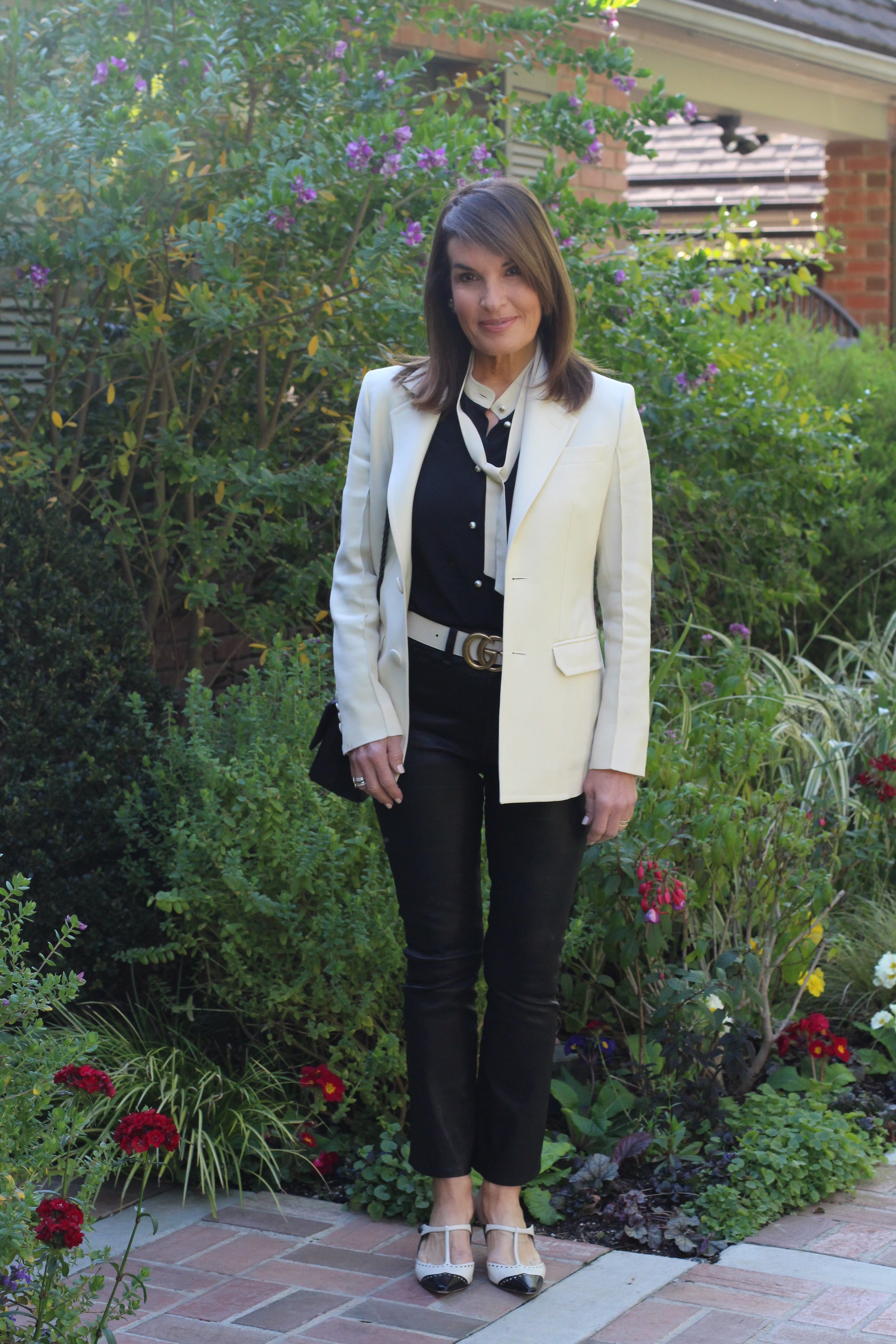 Bally Blazer, Gucci Blouse and Belt, Rag and Bone Leather Jeans, Dior Mules and Tribal Earrings, Spinelli Kilcollin Ring, Chanel handbag and Sunglasses.