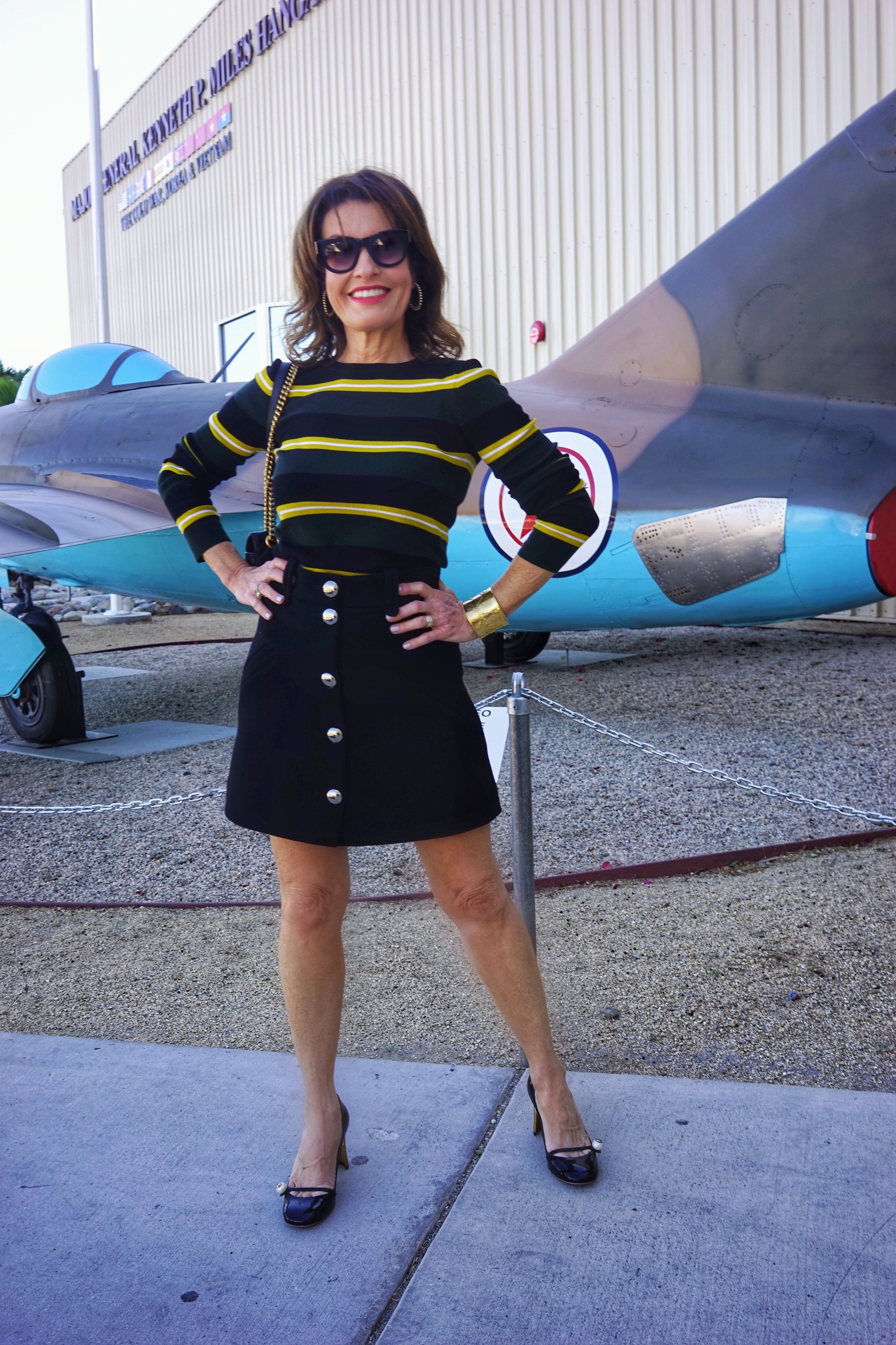 Chloe Skirt, Philip Lim Sweater, Gucci Shoes and Handbag, Celine Sunnies.