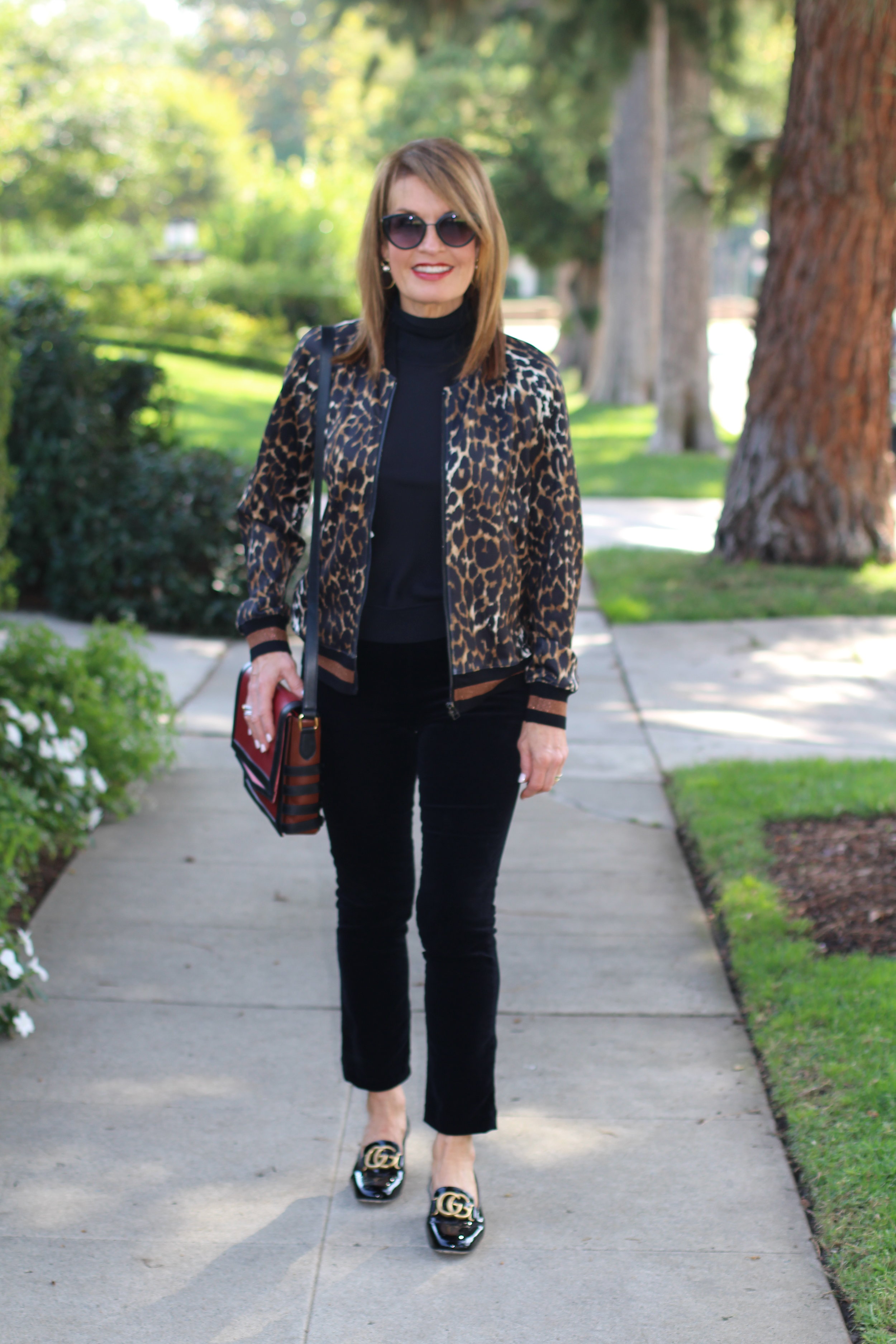 Pam and Gela Jacket, Theory Top, J Brand Velvet Pants, Gucci Shoes, Christian Louboutin Handbag, Chanel Sunglasses, Madewell Earrings.