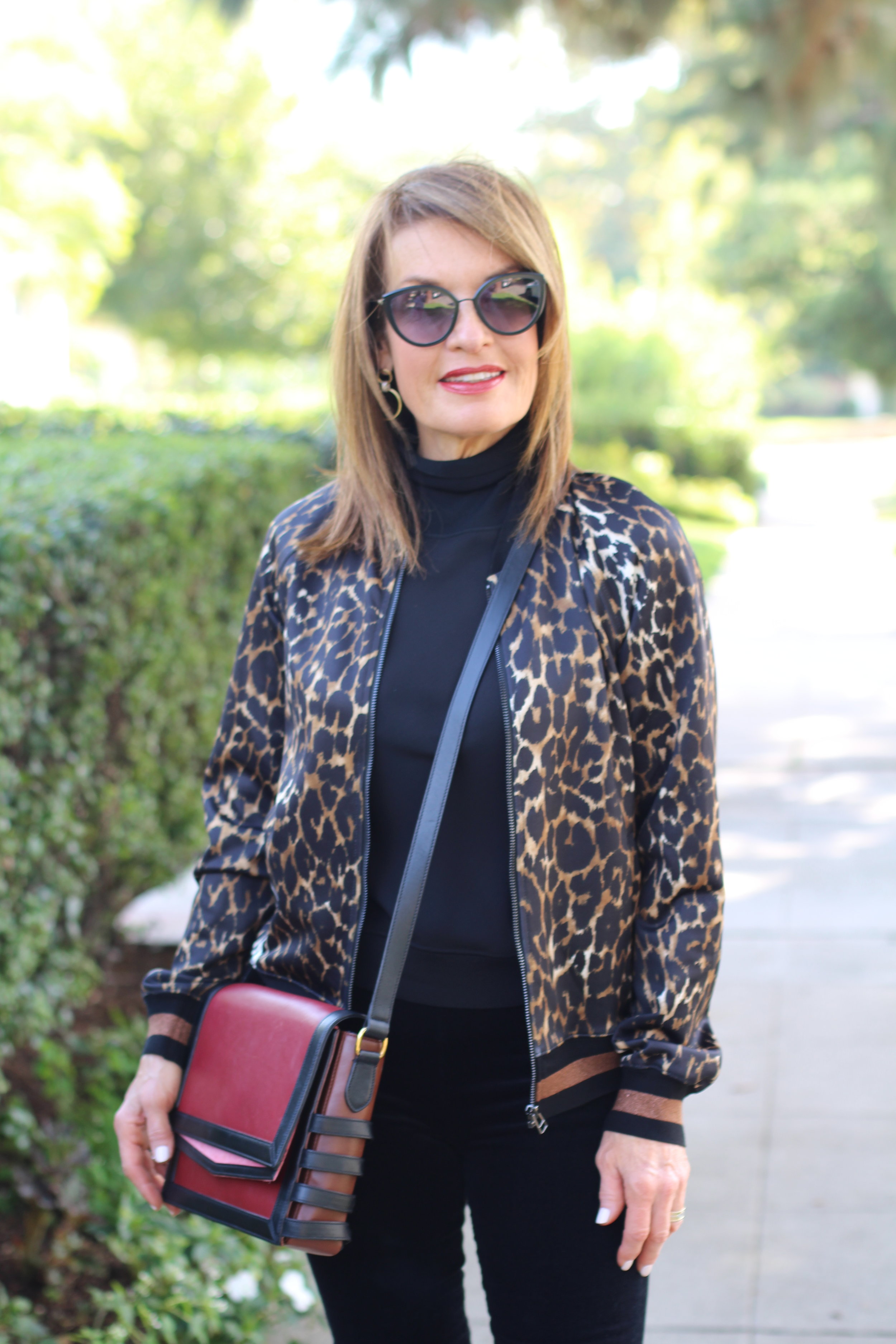 Pam and Gela Jacket, Theory Top, J Brand Velvet Pants, Gucci Shoes, Christian Louboutin Handbag, Chanel Sunglasses, Madewell Earrings.