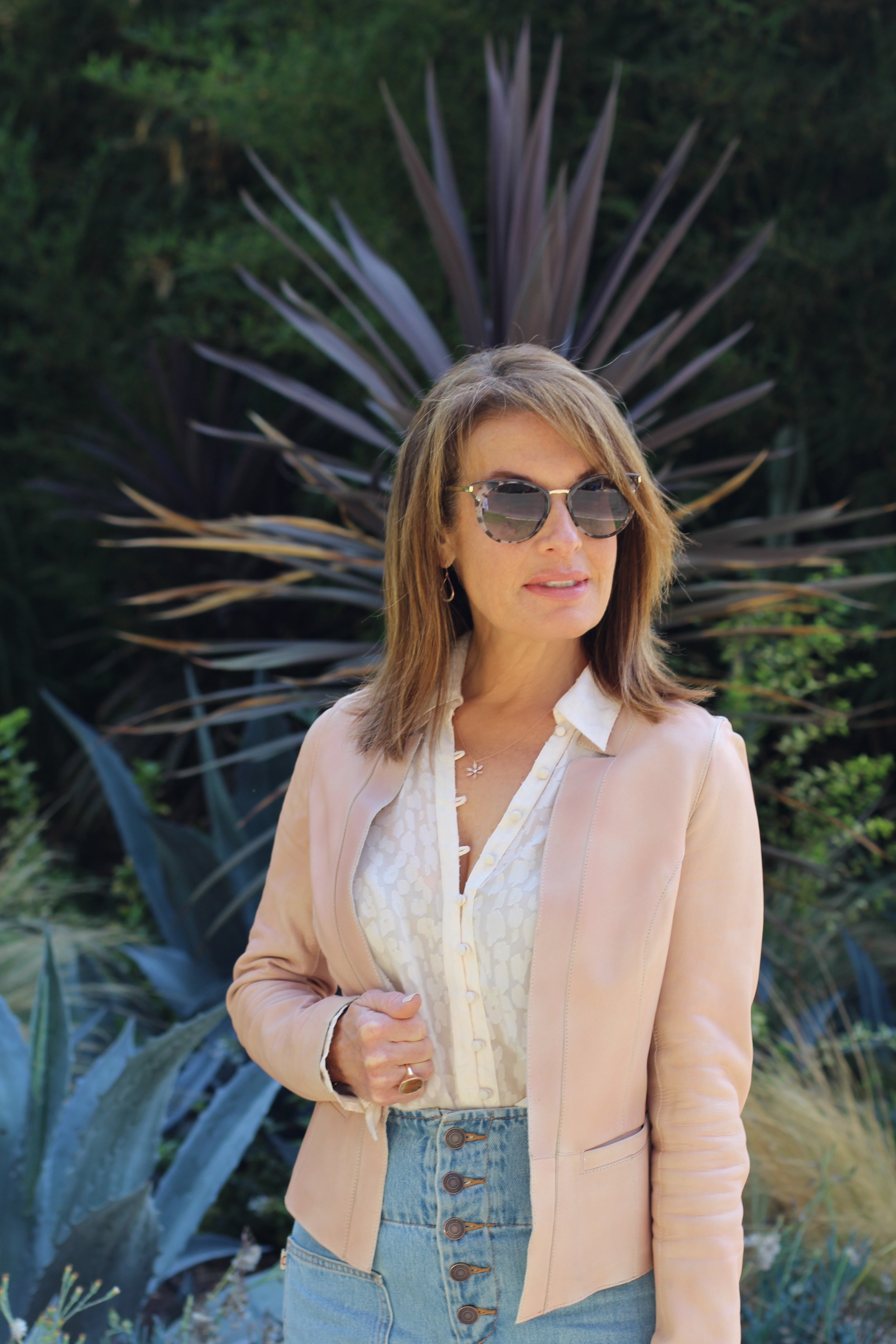 Lamarque Jacket, Paige Blouse, Marc Jacobs Jeans, Fendi Handbag, Prada Sunglasses, Valentino Shoes, Ipollita Earrings, Robin Terman Necklace.