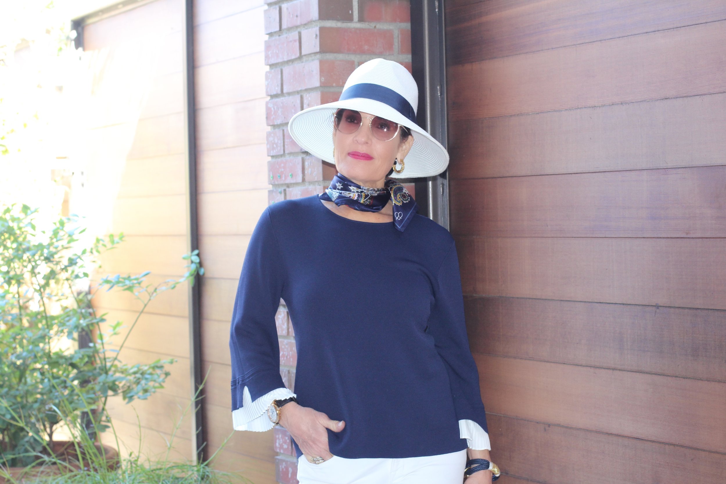 Gottex Hat, Gucci Shades, A World Curated Top and Scarf, (in photos below), J Brand Jeans, Laurence Decade Sandals, Fendi Bag, J Crew Bracelet, Earrings ($10.00) available at Jami Lynn Boutique.