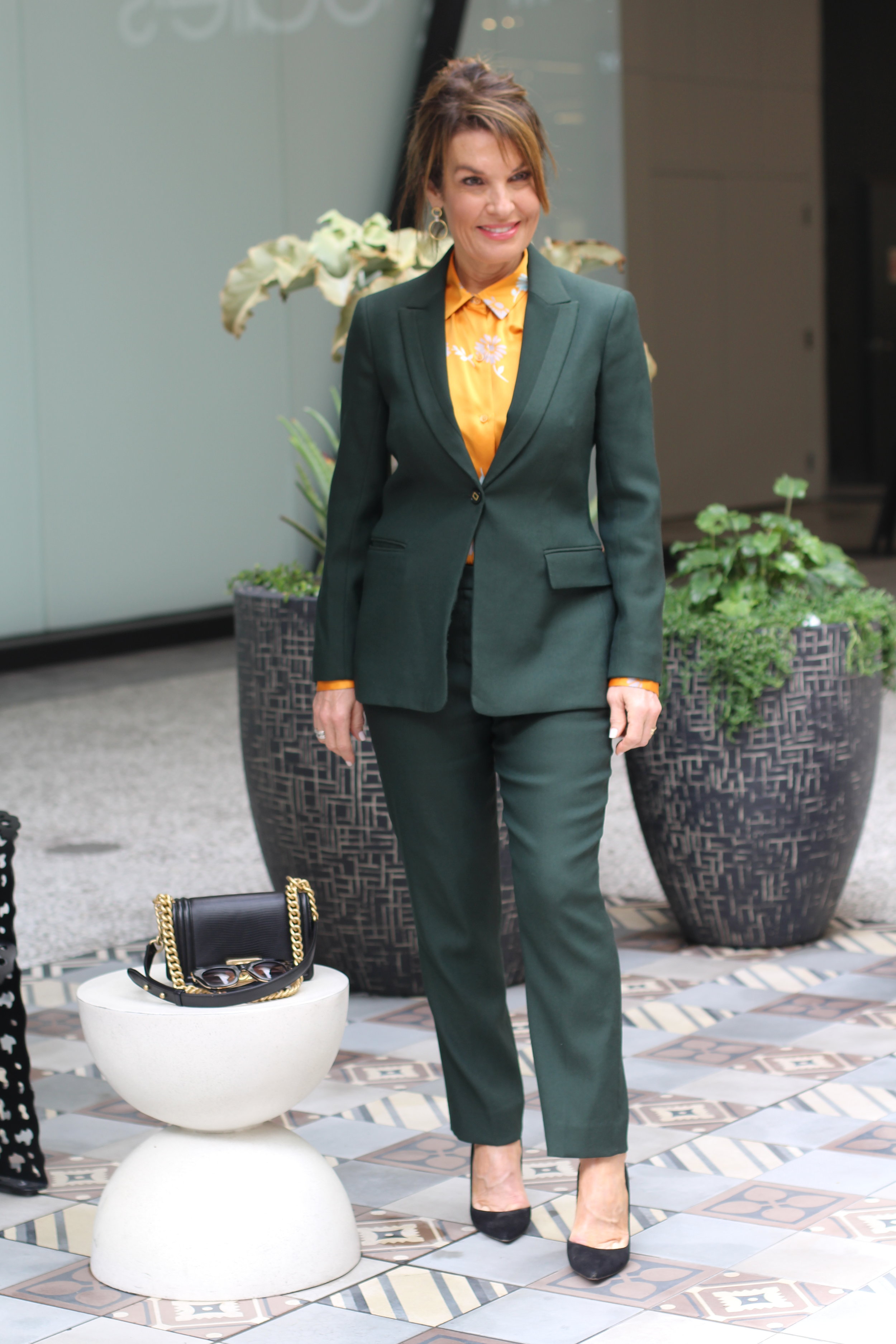 The Row Jacket and Pants, Equipment Blouse, Gianvanito Rossi Shoes, Chanel Handbag, Celine Sunglasses, Madewell Earrings.