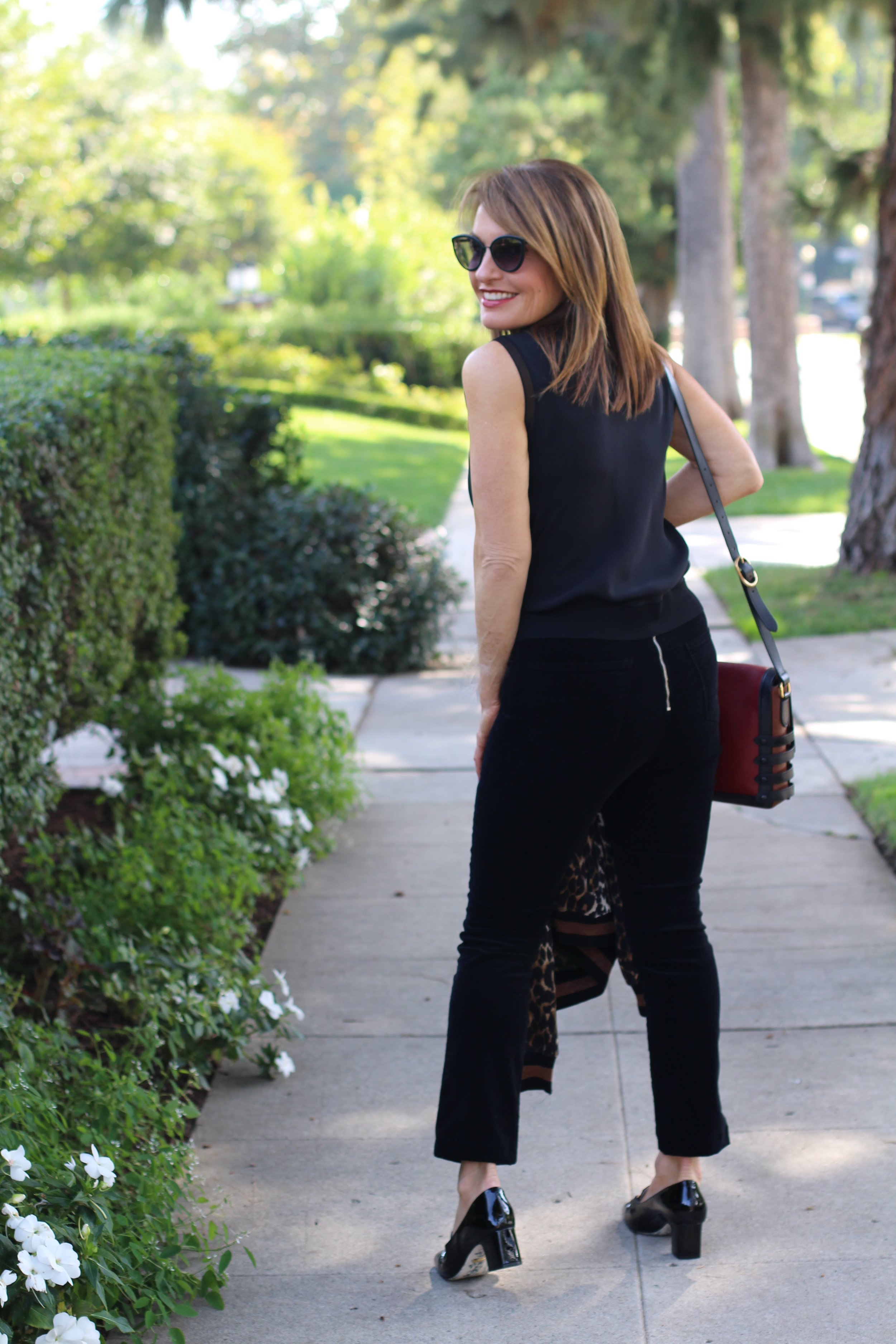 Pam and Gela Jacket, Theory Top, J Brand Velvet Pants, Gucci Shoes, Christian Louboutin Handbag, Chanel Sunglasses, Madewell Earrings.