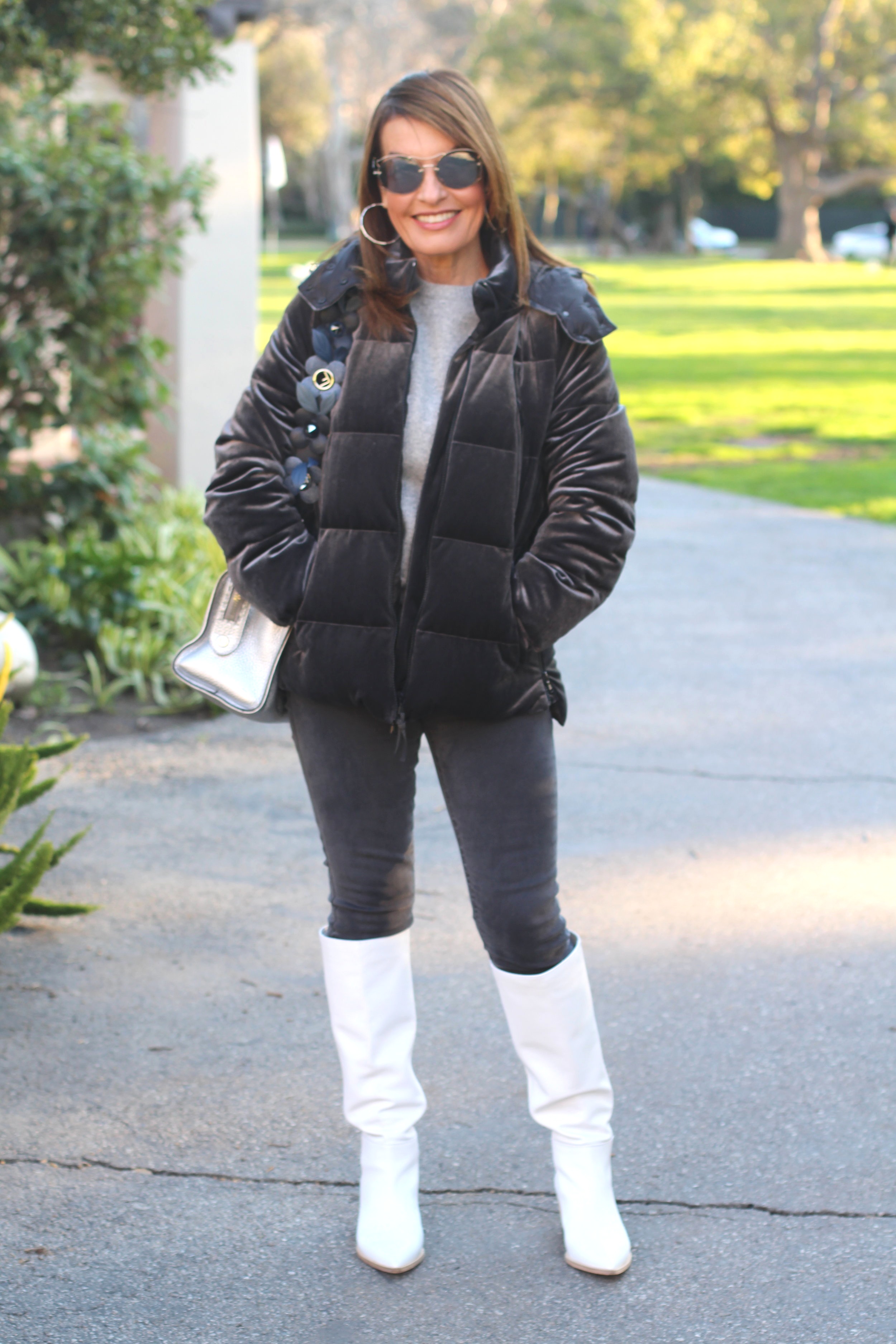 Max Mara Sweater, J Brand Jeans, Gianvito Rossi Boots, Brunello Cucinelli Jacket, Fendi Handbag and Strap, Miu Miu Sunnies, John Hardy Earrings, Spinelli Kilcollin Ring.