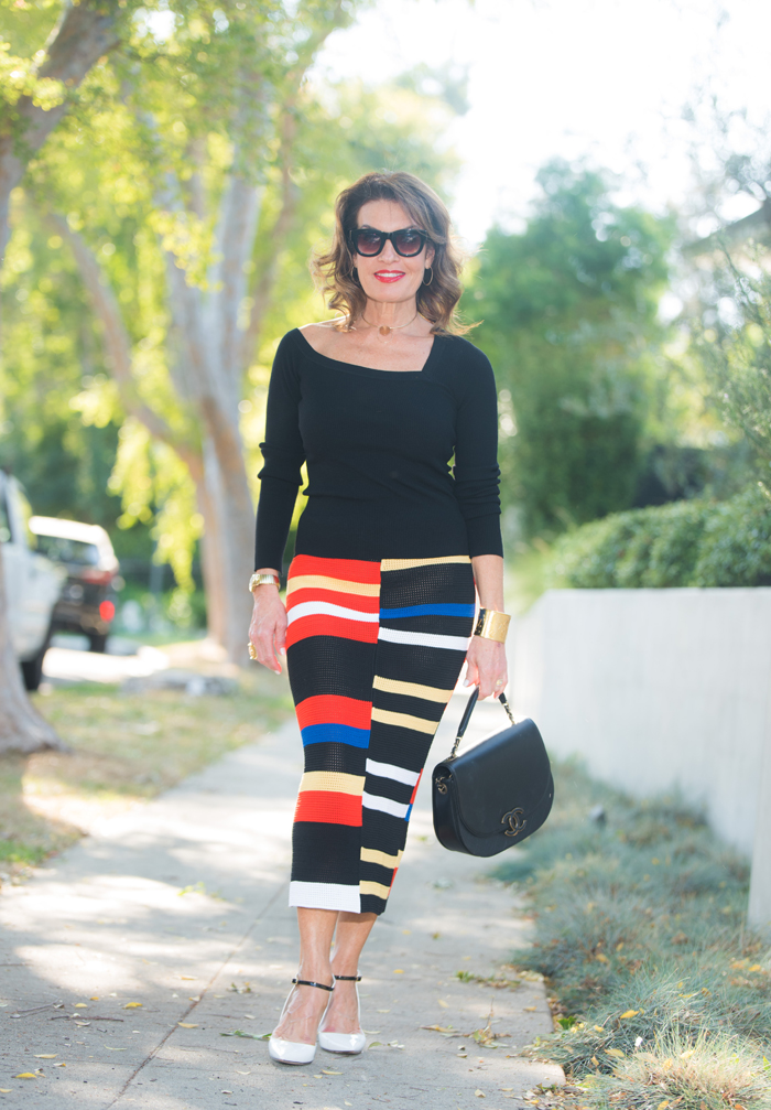 Preoonza Schouler Skirt, ALC Sweater, Jimmy Choo Heels, Chanel Bag, Robin Terman Hoops, Permanent Vacation Choker. 