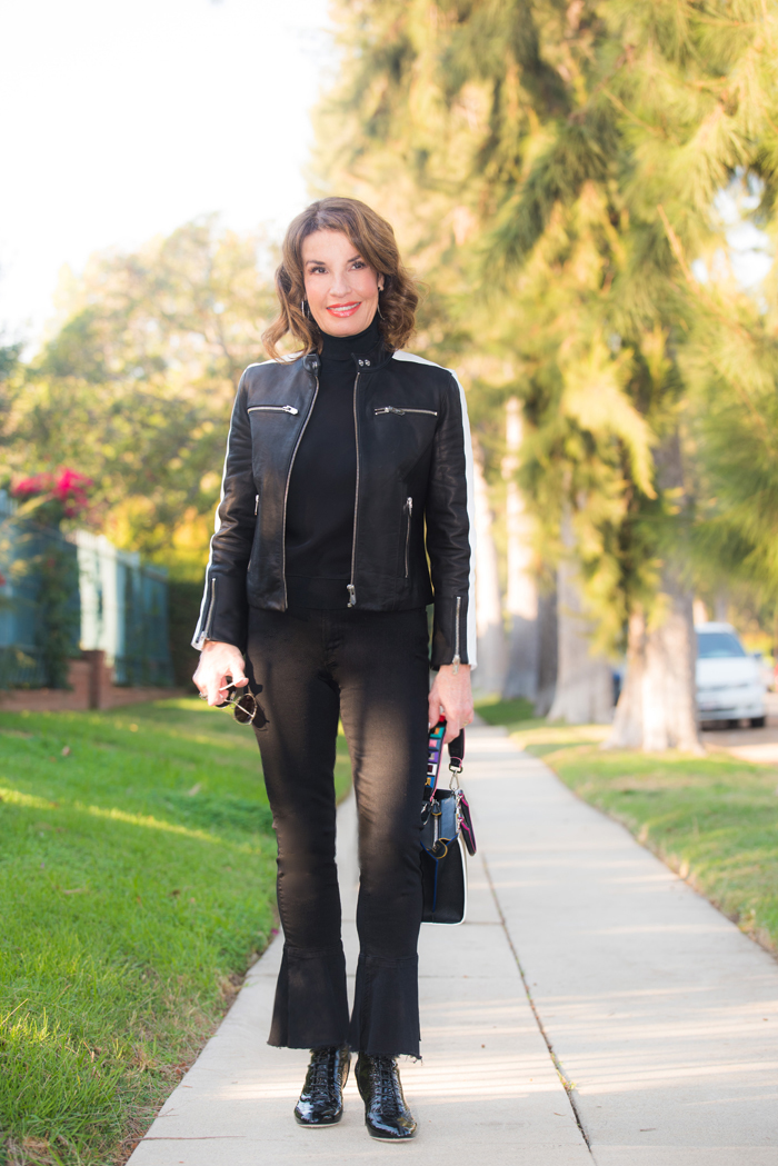 The Mighty Company Leather Jacket, Theory Top, Mother Jeans, Jimmy Choo (c/o Bloomingdales), Miu Miu Shades, Fendi Bag. 