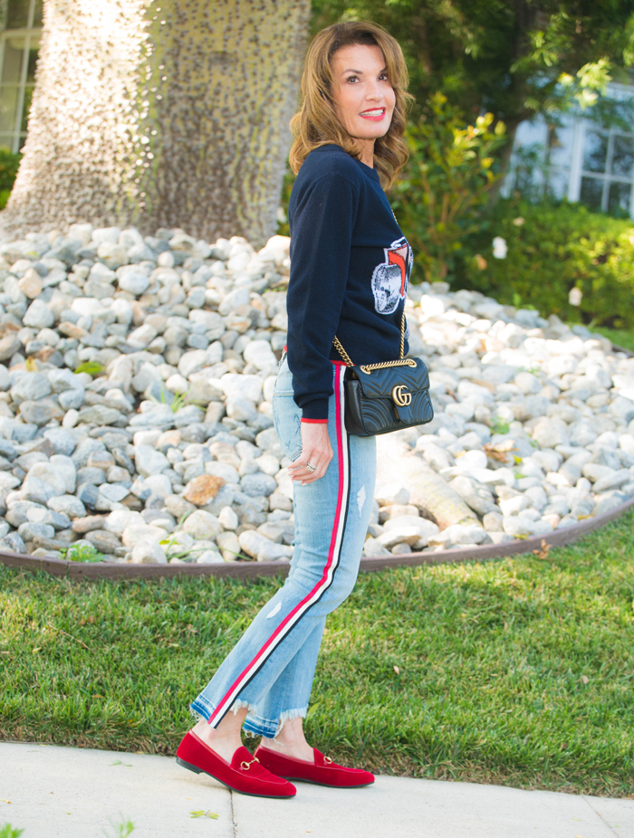 Stella McCartney Sweater, Mcguire jeans, Gucci Bag, Gucci Loafers, Celine Sunglasses.