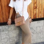 A Long Knit Skirt and Short White Tee.